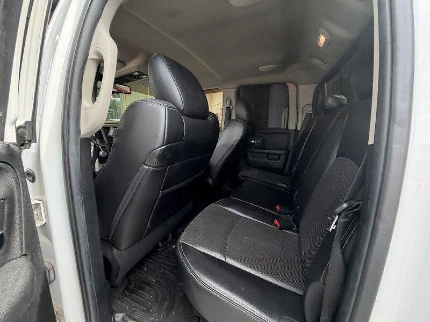 2014 Bright White Clear Coat/Bright Silver Metallic Cle RAM 1500 Laramie (1C6RR6JG8ES) with an 3.6L Flex Fuel V6 305hp 269ft. lbs. engine, Automatic transmission, located at 25355 Eames Street, Channahon, IL, 60410, (815) 467-1807, 41.429108, -88.228432 - Heres the honest deal truck. Laramie package with leather, 4x4, and the V6 engine but this one is being sold AS-IS AS SHOWN and priced accordingly. What it needs: Rust repair Tires Brakes SES light on for an EVAP leak Not a showroom queen but if you need a cheap 4x4, a work truck, winter beater - Photo#12