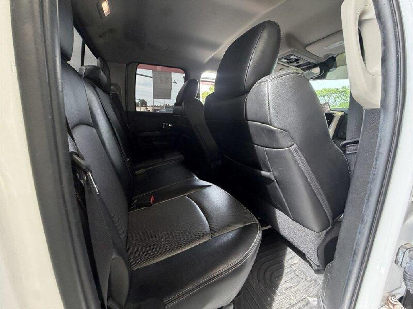 2014 Bright White Clear Coat/Bright Silver Metallic Cle RAM 1500 Laramie (1C6RR6JG8ES) with an 3.6L Flex Fuel V6 305hp 269ft. lbs. engine, Automatic transmission, located at 25355 Eames Street, Channahon, IL, 60410, (815) 467-1807, 41.429108, -88.228432 - Heres the honest deal truck. Laramie package with leather, 4x4, and the V6 engine but this one is being sold AS-IS AS SHOWN and priced accordingly. What it needs: Rust repair Tires Brakes SES light on for an EVAP leak Not a showroom queen but if you need a cheap 4x4, a work truck, winter beater - Photo#13