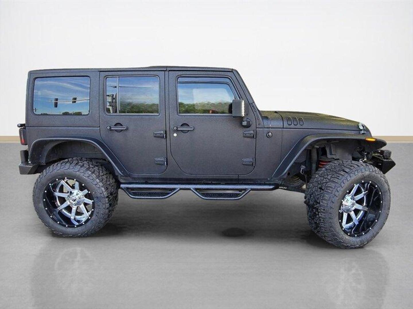 2014 Black Clear Coat Jeep Wrangler Unlimited Sport (1C4HJWDG5EL) with an 3.6L V6 285hp 260ft. lbs. engine, Automatic transmission, located at 25355 Eames Street, Channahon, IL, 60410, (815) 467-1807, 41.429108, -88.228432 - ** STARWOOD MOTORS CONVERSION, WHOLE TRUCK IS RHINO LINED THAT ALONE WAS $12,000, ALSO HAS A TERAFLEX SUSPENSION LIFT, WARN WINCH, OFFROAD BUMPERS, LIGHTS EVERYWHERE INCLUDING IN THE WHEELWELLS AND UNDERNEATH. ** OVER $20,000 TO BUILD. The 2014 Jeep Wrangler Unlimited Sport is equipped with a robust - Photo#1
