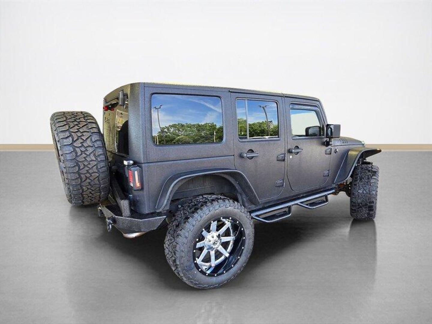 2014 Black Clear Coat Jeep Wrangler Unlimited Sport (1C4HJWDG5EL) with an 3.6L V6 285hp 260ft. lbs. engine, Automatic transmission, located at 25355 Eames Street, Channahon, IL, 60410, (815) 467-1807, 41.429108, -88.228432 - ** STARWOOD MOTORS CONVERSION, WHOLE TRUCK IS RHINO LINED THAT ALONE WAS $12,000, ALSO HAS A TERAFLEX SUSPENSION LIFT, WARN WINCH, OFFROAD BUMPERS, LIGHTS EVERYWHERE INCLUDING IN THE WHEELWELLS AND UNDERNEATH. ** OVER $20,000 TO BUILD. The 2014 Jeep Wrangler Unlimited Sport is equipped with a robust - Photo#3
