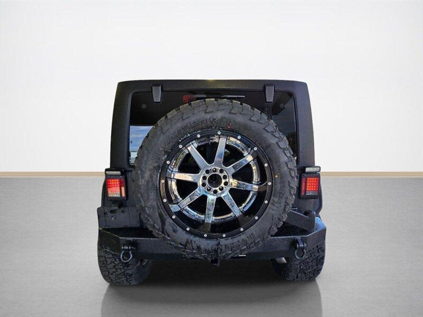 2014 Black Clear Coat Jeep Wrangler Unlimited Sport (1C4HJWDG5EL) with an 3.6L V6 285hp 260ft. lbs. engine, Automatic transmission, located at 25355 Eames Street, Channahon, IL, 60410, (815) 467-1807, 41.429108, -88.228432 - ** STARWOOD MOTORS CONVERSION, WHOLE TRUCK IS RHINO LINED THAT ALONE WAS $12,000, ALSO HAS A TERAFLEX SUSPENSION LIFT, WARN WINCH, OFFROAD BUMPERS, LIGHTS EVERYWHERE INCLUDING IN THE WHEELWELLS AND UNDERNEATH. ** OVER $20,000 TO BUILD. The 2014 Jeep Wrangler Unlimited Sport is equipped with a robust - Photo#4