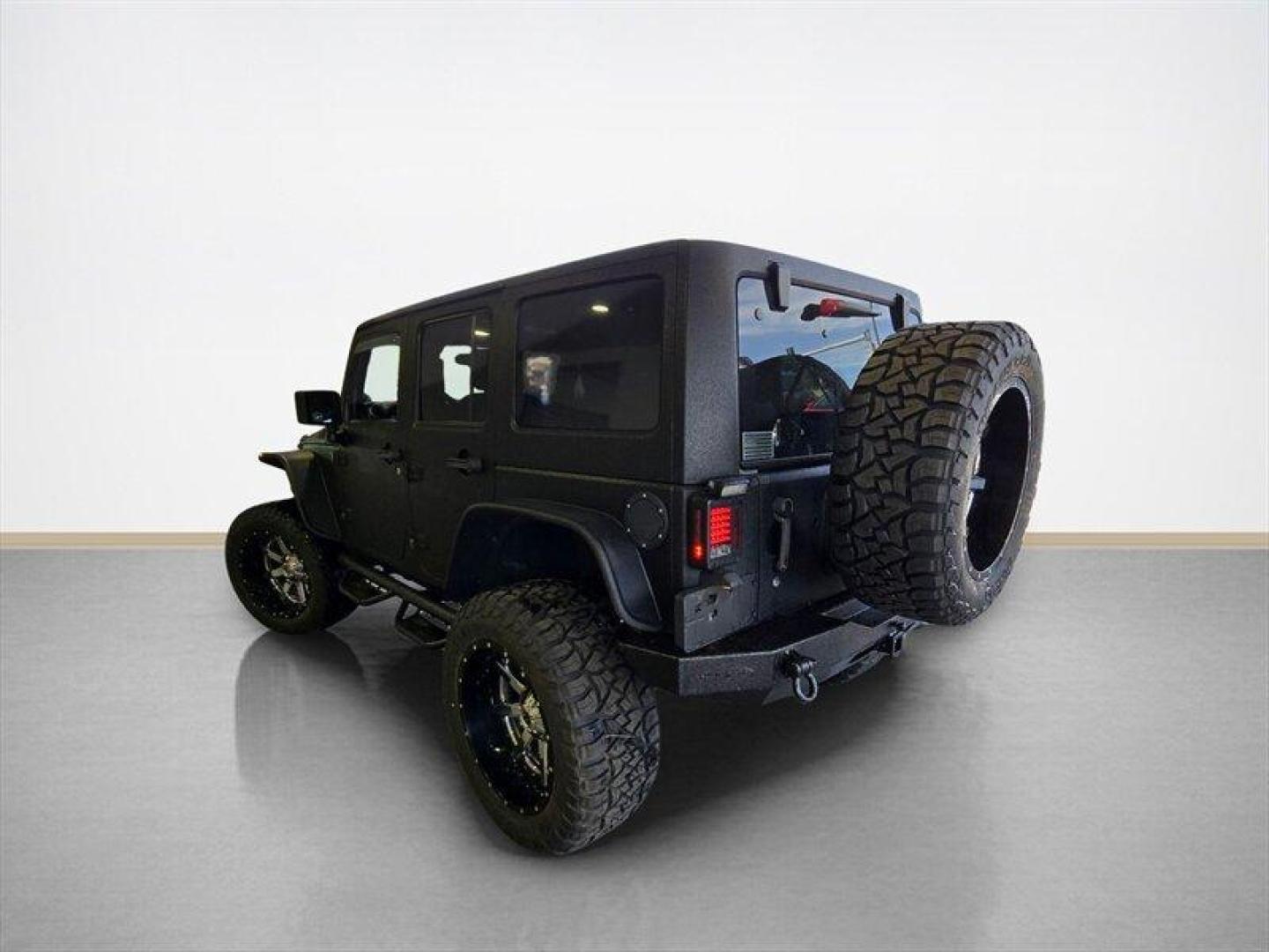 2014 Black Clear Coat Jeep Wrangler Unlimited Sport (1C4HJWDG5EL) with an 3.6L V6 285hp 260ft. lbs. engine, Automatic transmission, located at 25355 Eames Street, Channahon, IL, 60410, (815) 467-1807, 41.429108, -88.228432 - ** STARWOOD MOTORS CONVERSION, WHOLE TRUCK IS RHINO LINED THAT ALONE WAS $12,000, ALSO HAS A TERAFLEX SUSPENSION LIFT, WARN WINCH, OFFROAD BUMPERS, LIGHTS EVERYWHERE INCLUDING IN THE WHEELWELLS AND UNDERNEATH. ** OVER $20,000 TO BUILD. The 2014 Jeep Wrangler Unlimited Sport is equipped with a robust - Photo#5