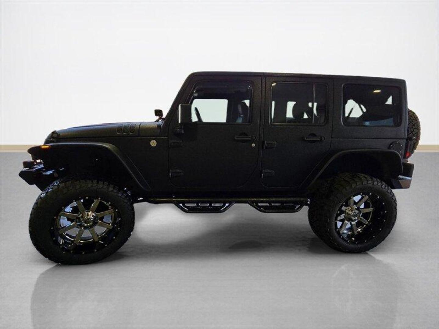 2014 Black Clear Coat Jeep Wrangler Unlimited Sport (1C4HJWDG5EL) with an 3.6L V6 285hp 260ft. lbs. engine, Automatic transmission, located at 25355 Eames Street, Channahon, IL, 60410, (815) 467-1807, 41.429108, -88.228432 - ** STARWOOD MOTORS CONVERSION, WHOLE TRUCK IS RHINO LINED THAT ALONE WAS $12,000, ALSO HAS A TERAFLEX SUSPENSION LIFT, WARN WINCH, OFFROAD BUMPERS, LIGHTS EVERYWHERE INCLUDING IN THE WHEELWELLS AND UNDERNEATH. ** OVER $20,000 TO BUILD. The 2014 Jeep Wrangler Unlimited Sport is equipped with a robust - Photo#6