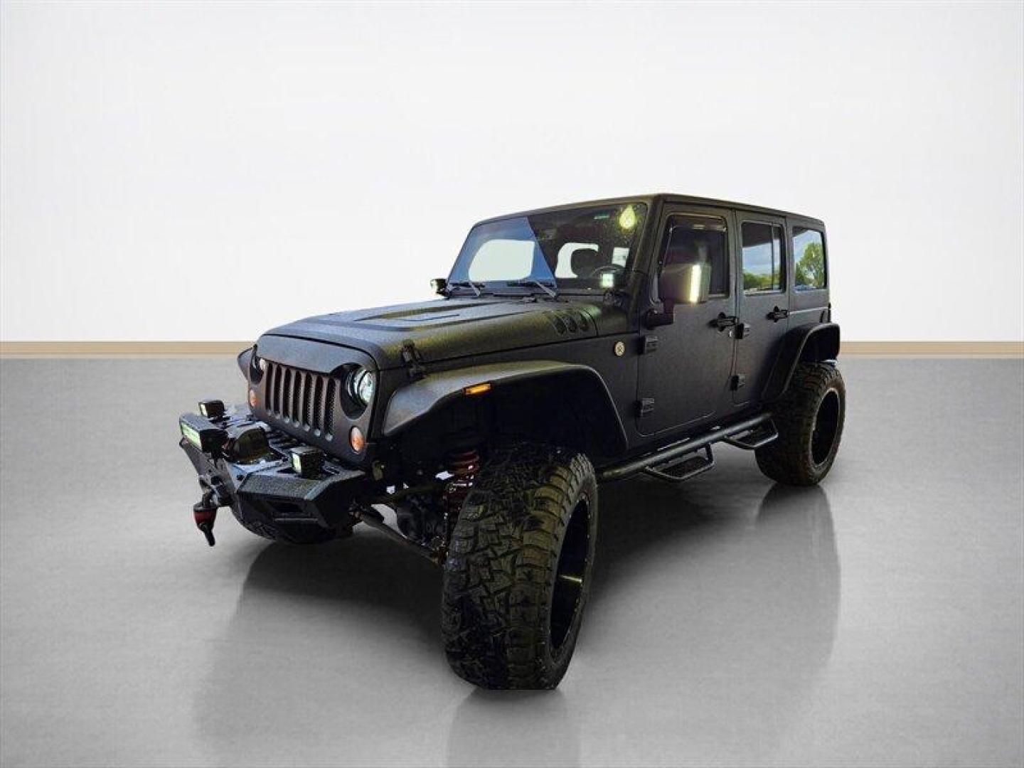 2014 Black Clear Coat Jeep Wrangler Unlimited Sport (1C4HJWDG5EL) with an 3.6L V6 285hp 260ft. lbs. engine, Automatic transmission, located at 25355 Eames Street, Channahon, IL, 60410, (815) 467-1807, 41.429108, -88.228432 - ** STARWOOD MOTORS CONVERSION, WHOLE TRUCK IS RHINO LINED THAT ALONE WAS $12,000, ALSO HAS A TERAFLEX SUSPENSION LIFT, WARN WINCH, OFFROAD BUMPERS, LIGHTS EVERYWHERE INCLUDING IN THE WHEELWELLS AND UNDERNEATH. ** OVER $20,000 TO BUILD. The 2014 Jeep Wrangler Unlimited Sport is equipped with a robust - Photo#7
