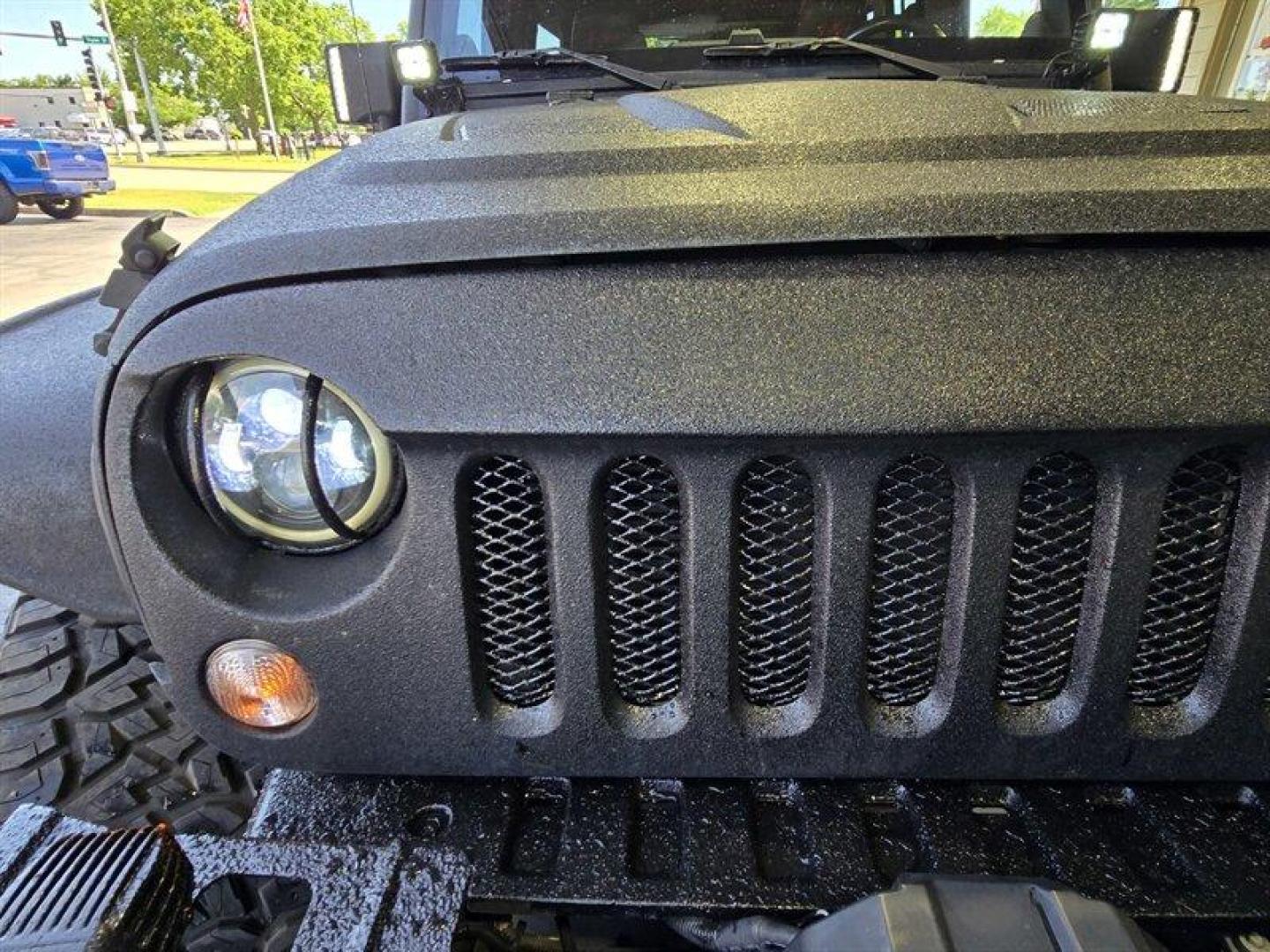 2014 Black Clear Coat Jeep Wrangler Unlimited Sport (1C4HJWDG5EL) with an 3.6L V6 285hp 260ft. lbs. engine, Automatic transmission, located at 25355 Eames Street, Channahon, IL, 60410, (815) 467-1807, 41.429108, -88.228432 - ** STARWOOD MOTORS CONVERSION, WHOLE TRUCK IS RHINO LINED THAT ALONE WAS $12,000, ALSO HAS A TERAFLEX SUSPENSION LIFT, WARN WINCH, OFFROAD BUMPERS, LIGHTS EVERYWHERE INCLUDING IN THE WHEELWELLS AND UNDERNEATH. ** OVER $20,000 TO BUILD. The 2014 Jeep Wrangler Unlimited Sport is equipped with a robust - Photo#10
