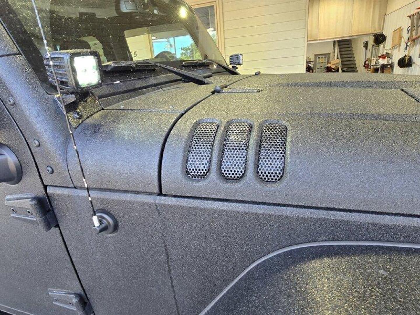 2014 Black Clear Coat Jeep Wrangler Unlimited Sport (1C4HJWDG5EL) with an 3.6L V6 285hp 260ft. lbs. engine, Automatic transmission, located at 25355 Eames Street, Channahon, IL, 60410, (815) 467-1807, 41.429108, -88.228432 - ** STARWOOD MOTORS CONVERSION, WHOLE TRUCK IS RHINO LINED THAT ALONE WAS $12,000, ALSO HAS A TERAFLEX SUSPENSION LIFT, WARN WINCH, OFFROAD BUMPERS, LIGHTS EVERYWHERE INCLUDING IN THE WHEELWELLS AND UNDERNEATH. ** OVER $20,000 TO BUILD. The 2014 Jeep Wrangler Unlimited Sport is equipped with a robust - Photo#16