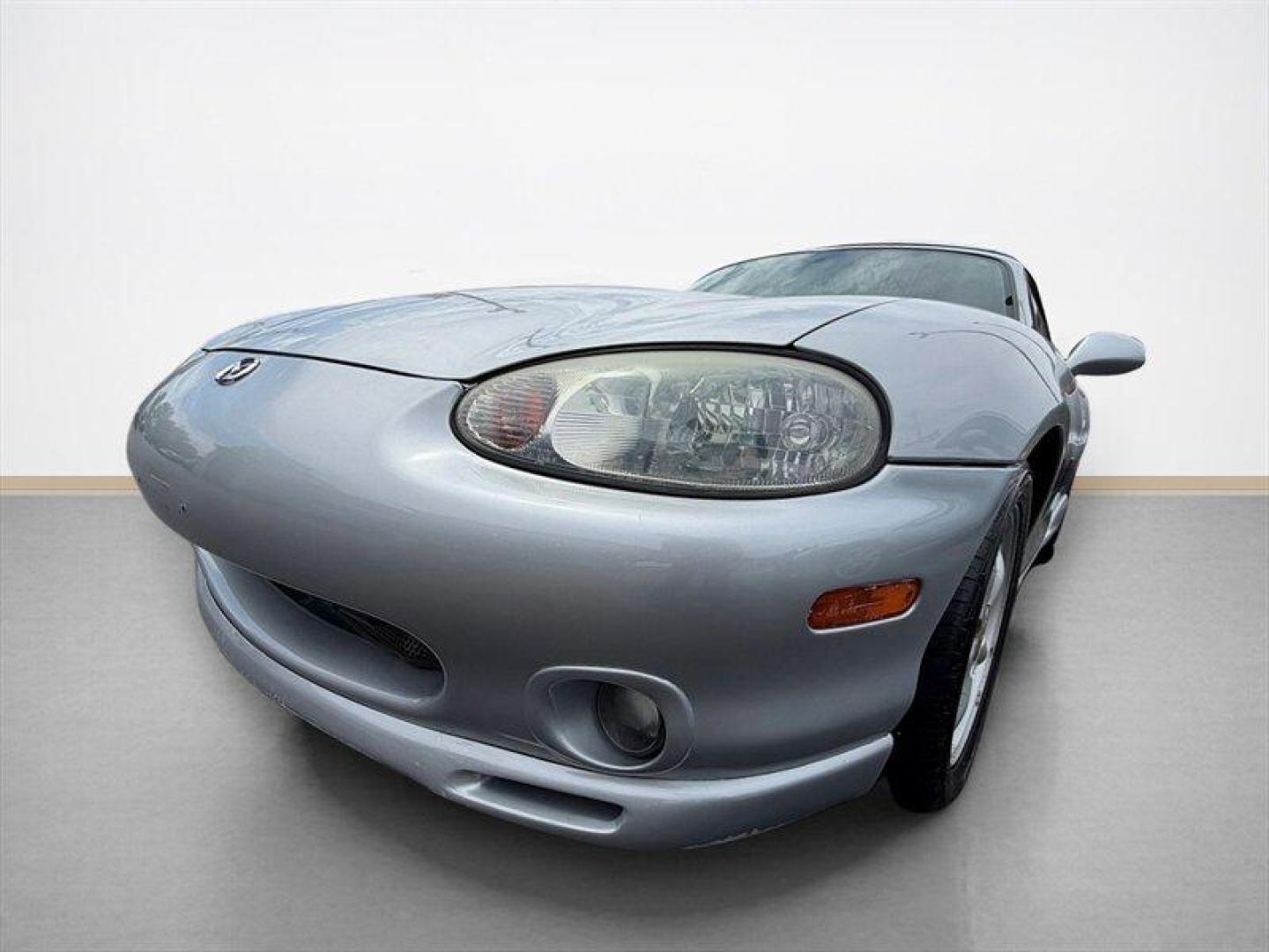 2000 Highlight Silver Metallic Mazda MX-5 Miata (JM1NB3533Y0) with an 1L NA I4 double overhead cam (DOHC) 16V engine, Automatic transmission, located at 25355 Eames Street, Channahon, IL, 60410, (815) 467-1807, 41.429108, -88.228432 - Looking for a classic roadster thats as fun to drive as it is stylish? Check out this 2000 Mazda MX-5 Miata in stunning Highlight Silver Metallic! Under the hood, youll find a lively 1.0L naturally aspirated inline-4 engine with double overhead cams (DOHC) and 16 valves, delivering a smooth and resp - Photo#7