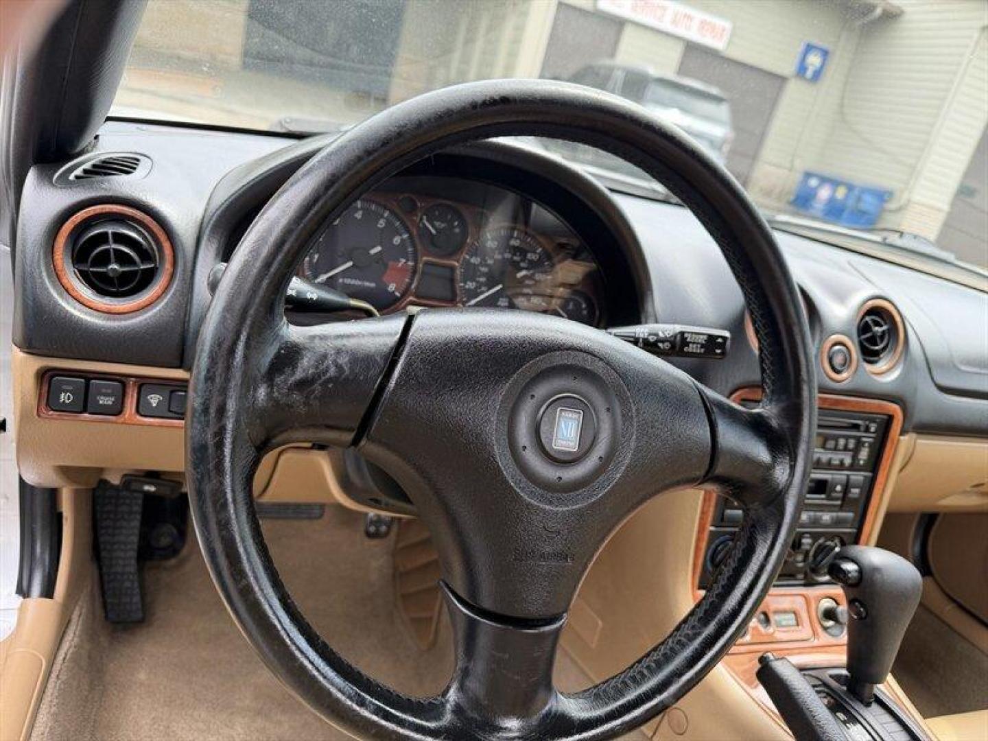2000 Highlight Silver Metallic Mazda MX-5 Miata (JM1NB3533Y0) with an 1L NA I4 double overhead cam (DOHC) 16V engine, Automatic transmission, located at 25355 Eames Street, Channahon, IL, 60410, (815) 467-1807, 41.429108, -88.228432 - Looking for a classic roadster thats as fun to drive as it is stylish? Check out this 2000 Mazda MX-5 Miata in stunning Highlight Silver Metallic! Under the hood, youll find a lively 1.0L naturally aspirated inline-4 engine with double overhead cams (DOHC) and 16 valves, delivering a smooth and resp - Photo#15