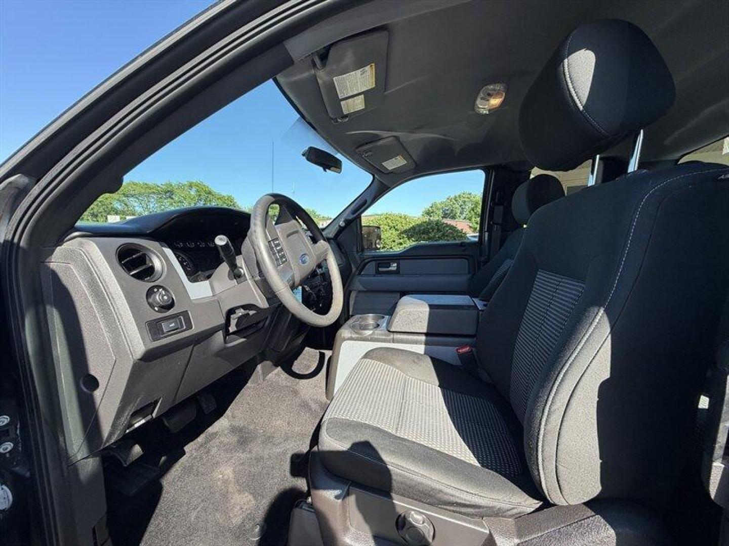 2014 Tuxedo Black Metallic Ford F-150 STX (1FTEX1EM3EF) with an 3.7L Flex Fuel V6 302hp 278ft. lbs. engine, Automatic transmission, located at 25355 Eames Street, Channahon, IL, 60410, (815) 467-1807, 41.429108, -88.228432 - Ready to turn heads and haul with serious style? Feast your eyes on this 2014 Ford F-150 STX in the sleek and sophisticated Tuxedo Black Metallicbecause black isnt just a color, its an attitude. Under the hood, this beast runs on a 3.7L Flex Fuel V6, pumping out a juicy 302 horsepower and 278 ft-lbs - Photo#11