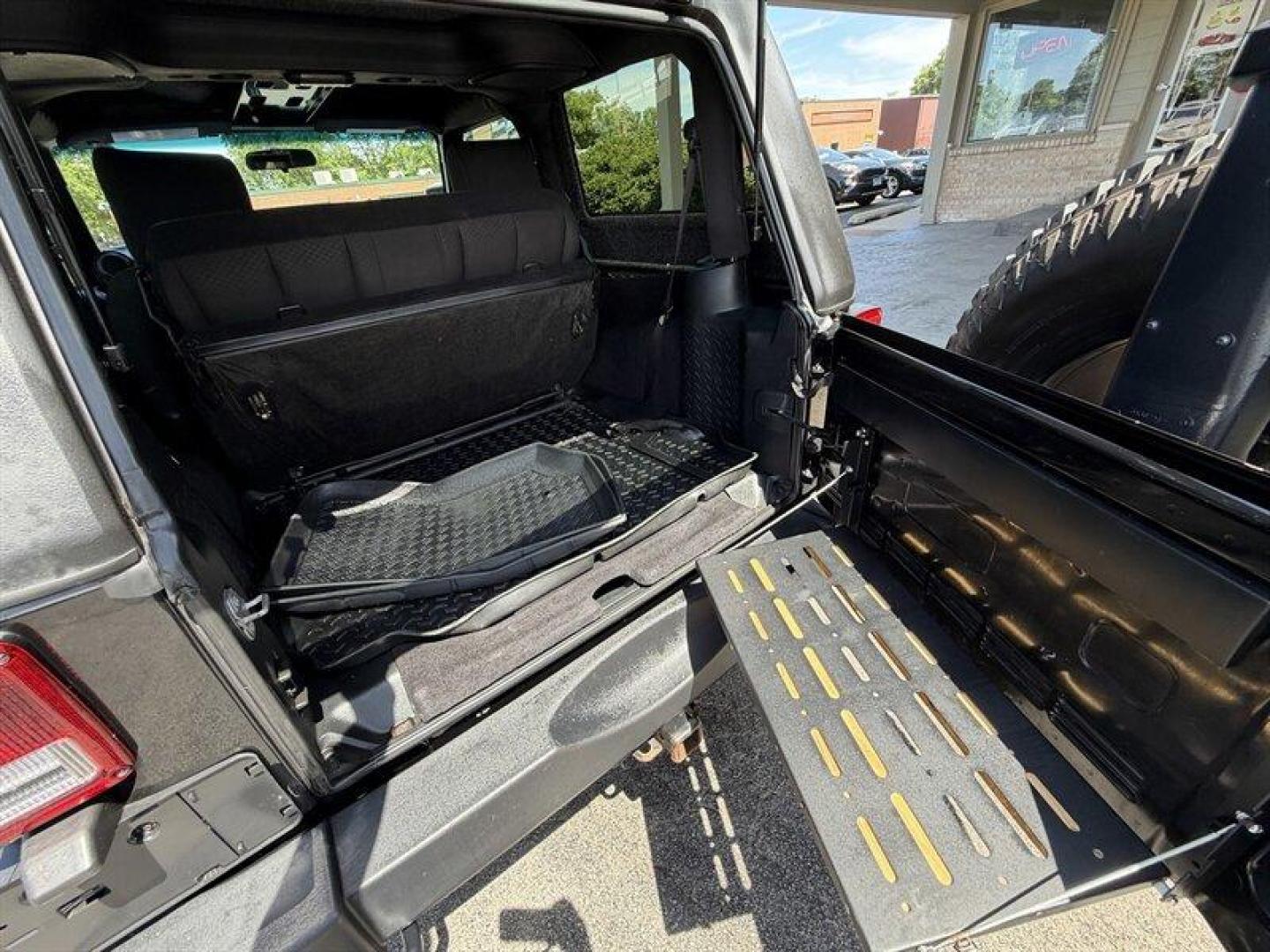 2018 Black Clear Coat Jeep Wrangler JK Sport (1C4AJWAG5JL) with an 3.6L V6 285hp 260ft. lbs. engine, 6 Speed Manual transmission, located at 25355 Eames Street, Channahon, IL, 60410, (815) 467-1807, 41.429108, -88.228432 - Unleash your wild side with this 2018 Jeep Wrangler JK Sport the ultimate off-road machine built to conquer any terrain and dominate the road. Powered by a fierce 3.6L V6 engine delivering a robust 285 horsepower and 260 ft-lbs of torque, this beast roars to life with unstoppable power and relentle - Photo#8