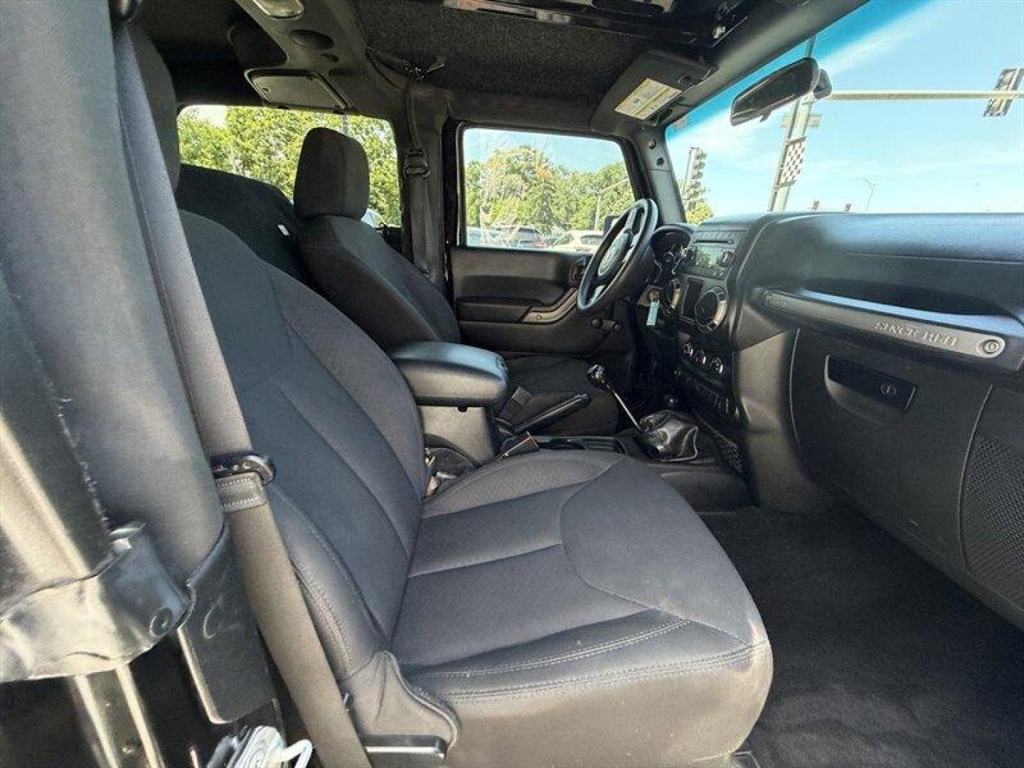 2018 Black Clear Coat Jeep Wrangler JK Sport (1C4AJWAG5JL) with an 3.6L V6 285hp 260ft. lbs. engine, 6 Speed Manual transmission, located at 25355 Eames Street, Channahon, IL, 60410, (815) 467-1807, 41.429108, -88.228432 - Unleash your wild side with this 2018 Jeep Wrangler JK Sport the ultimate off-road machine built to conquer any terrain and dominate the road. Powered by a fierce 3.6L V6 engine delivering a robust 285 horsepower and 260 ft-lbs of torque, this beast roars to life with unstoppable power and relentle - Photo#9