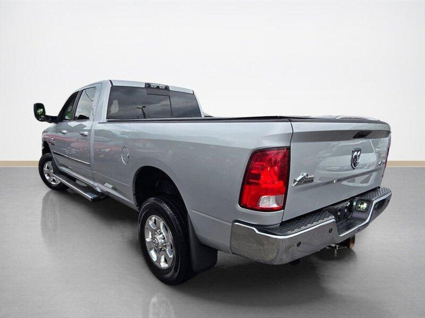 2016 Bright Silver Metallic Clear Coat RAM 2500 Big Horn (3C6UR5JL8GG) with an Cummins 6.7L Diesel Turbo I6 350hp 660ft. lbs. engine, Automatic transmission, located at 25355 Eames Street, Channahon, IL, 60410, (815) 467-1807, 41.429108, -88.228432 - ** 6.7 CUMMINS, TUNED, DELETED, 8 FOOT LONG BED, REAR BAGS AND RUST FREE. ** The 2016 RAM 2500 SLT is a powerful and capable heavy-duty truck designed to handle demanding tasks with ease. Equipped with a Cummins 6.7L Diesel Turbo I6 engine, this model delivers impressive performance, producing 350 h - Photo#5