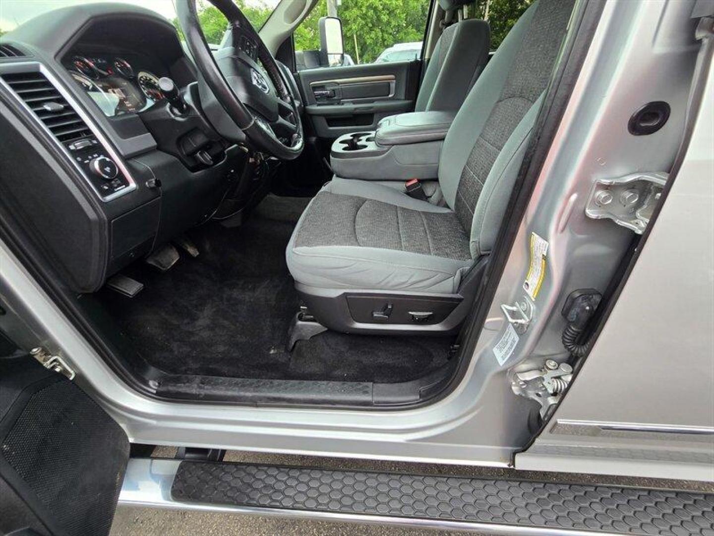 2016 Bright Silver Metallic Clear Coat RAM 2500 Big Horn (3C6UR5JL8GG) with an Cummins 6.7L Diesel Turbo I6 350hp 660ft. lbs. engine, Automatic transmission, located at 25355 Eames Street, Channahon, IL, 60410, (815) 467-1807, 41.429108, -88.228432 - ** 6.7 CUMMINS, TUNED, DELETED, 8 FOOT LONG BED, REAR BAGS AND RUST FREE. ** The 2016 RAM 2500 SLT is a powerful and capable heavy-duty truck designed to handle demanding tasks with ease. Equipped with a Cummins 6.7L Diesel Turbo I6 engine, this model delivers impressive performance, producing 350 h - Photo#9