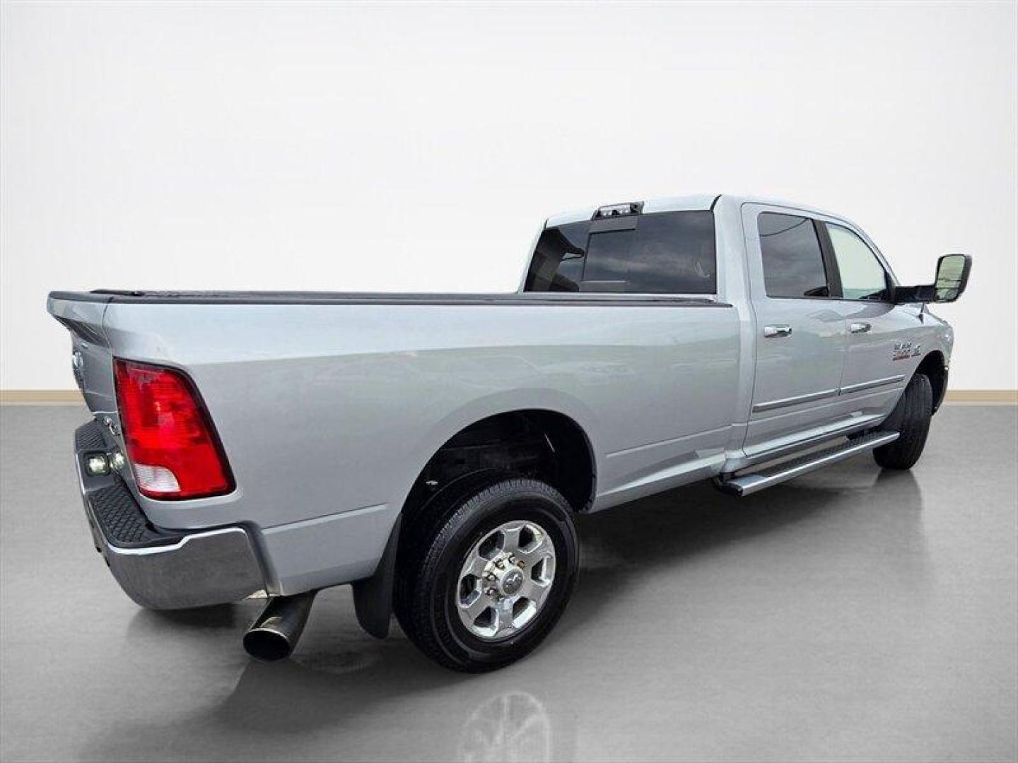 2016 Bright Silver Metallic Clear Coat RAM 2500 Big Horn (3C6UR5JL8GG) with an Cummins 6.7L Diesel Turbo I6 350hp 660ft. lbs. engine, Automatic transmission, located at 25355 Eames Street, Channahon, IL, 60410, (815) 467-1807, 41.429108, -88.228432 - ** 6.7 CUMMINS, TUNED, DELETED, 8 FOOT LONG BED, REAR BAGS AND RUST FREE. ** The 2016 RAM 2500 SLT is a powerful and capable heavy-duty truck designed to handle demanding tasks with ease. Equipped with a Cummins 6.7L Diesel Turbo I6 engine, this model delivers impressive performance, producing 350 h - Photo#3