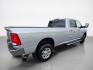2016 Bright Silver Metallic Clear Coat RAM 2500 Big Horn (3C6UR5JL8GG) with an Cummins 6.7L Diesel Turbo I6 350hp 660ft. lbs. engine, Automatic transmission, located at 25355 Eames Street, Channahon, IL, 60410, (815) 467-1807, 41.429108, -88.228432 - ** 6.7 CUMMINS, TUNED, DELETED, 8 FOOT LONG BED, REAR BAGS AND RUST FREE. ** The 2016 RAM 2500 SLT is a powerful and capable heavy-duty truck designed to handle demanding tasks with ease. Equipped with a Cummins 6.7L Diesel Turbo I6 engine, this model delivers impressive performance, producing 350 h - Photo#3