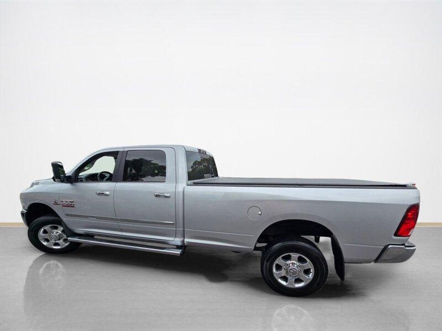 2016 Bright Silver Metallic Clear Coat RAM 2500 Big Horn (3C6UR5JL8GG) with an Cummins 6.7L Diesel Turbo I6 350hp 660ft. lbs. engine, Automatic transmission, located at 25355 Eames Street, Channahon, IL, 60410, (815) 467-1807, 41.429108, -88.228432 - ** 6.7 CUMMINS, TUNED, DELETED, 8 FOOT LONG BED, REAR BAGS AND RUST FREE. ** The 2016 RAM 2500 SLT is a powerful and capable heavy-duty truck designed to handle demanding tasks with ease. Equipped with a Cummins 6.7L Diesel Turbo I6 engine, this model delivers impressive performance, producing 350 h - Photo#6