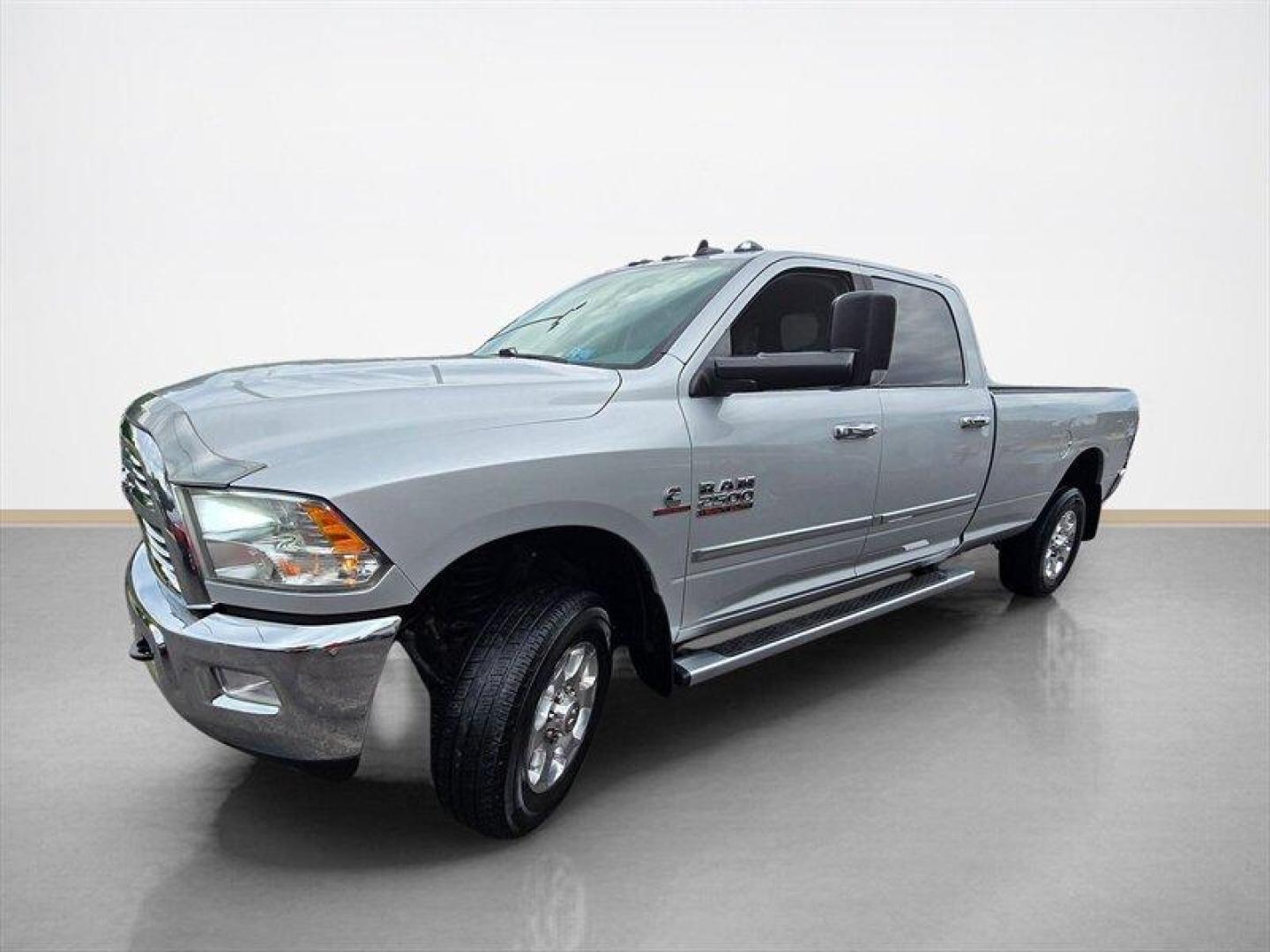2016 Bright Silver Metallic Clear Coat RAM 2500 Big Horn (3C6UR5JL8GG) with an Cummins 6.7L Diesel Turbo I6 350hp 660ft. lbs. engine, Automatic transmission, located at 25355 Eames Street, Channahon, IL, 60410, (815) 467-1807, 41.429108, -88.228432 - ** 6.7 CUMMINS, TUNED, DELETED, 8 FOOT LONG BED, REAR BAGS AND RUST FREE. ** The 2016 RAM 2500 SLT is a powerful and capable heavy-duty truck designed to handle demanding tasks with ease. Equipped with a Cummins 6.7L Diesel Turbo I6 engine, this model delivers impressive performance, producing 350 h - Photo#7