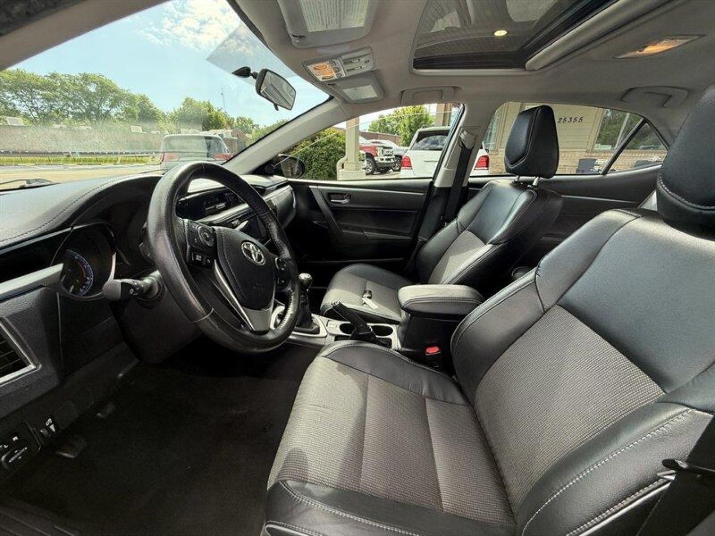 2014 Black Sand Pearl Toyota Corolla S Plus (2T1BURHE6EC) with an 1.8L I4 132hp 128ft. lbs. engine, 6 Speed Manual transmission, located at 25355 Eames Street, Channahon, IL, 60410, (815) 467-1807, 41.429108, -88.228432 - Feast your eyes on this 2014 Toyota Corolla S Plus, rocking a sleek Black Sand Pearl exterior thats basically begging for a second glance. Slide inside to the stylish Black/Steel Blue interiorbecause who said practicality cant have a little flair? Under the hood, its powered by a peppy 1.8L I4 engin - Photo#11
