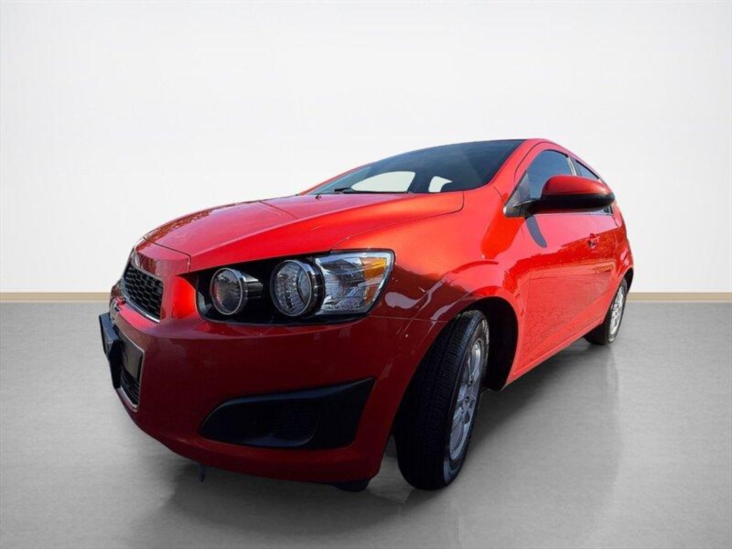 2012 Crystal Red Tintcoat Chevrolet Sonic 1LT (1G1JD6SB3C4) with an Ecotec 1.4L Turbo I4 138hp 148ft. lbs. engine, 5 Speed Manual transmission, located at 25355 Eames Street, Channahon, IL, 60410, (815) 467-1807, 41.429108, -88.228432 - Unleash the power and style of this 2012 Chevrolet Sonic LT, roaring into the spotlight with its standout Inferno Orange Metallic exterior that demands attention wherever you roll. Under the hood, the fierce Ecotec 1.4L Turbo I4 engine pumps out a solid 138 horsepower and 148 ft-lbs of torque, deliv- Photo#6