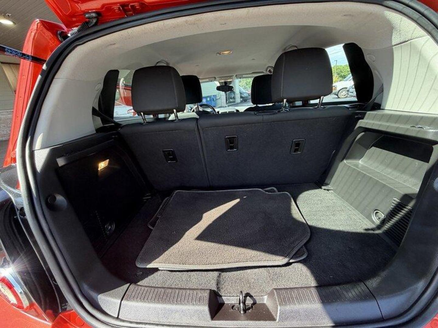 2012 Crystal Red Tintcoat Chevrolet Sonic 1LT (1G1JD6SB3C4) with an Ecotec 1.4L Turbo I4 138hp 148ft. lbs. engine, 5 Speed Manual transmission, located at 25355 Eames Street, Channahon, IL, 60410, (815) 467-1807, 41.429108, -88.228432 - Unleash the power and style of this 2012 Chevrolet Sonic LT, roaring into the spotlight with its standout Inferno Orange Metallic exterior that demands attention wherever you roll. Under the hood, the fierce Ecotec 1.4L Turbo I4 engine pumps out a solid 138 horsepower and 148 ft-lbs of torque, deliv- Photo#12