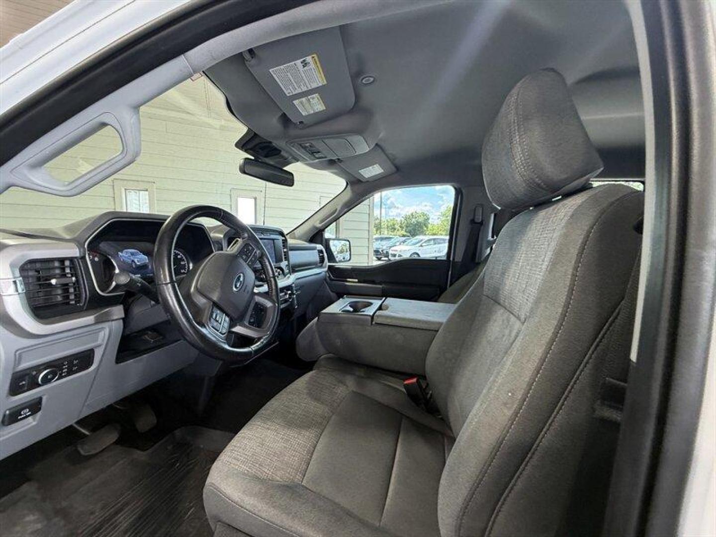 2022 Oxford White Ford F-150 XLT (1FTFW1E50NK) with an 5.0L Flex Fuel V8 400hp 410ft. lbs. engine, Automatic transmission, located at 25355 Eames Street, Channahon, IL, 60410, (815) 467-1807, 41.429108, -88.228432 - Forget the turbo debates. This one has the engine everyone asks for. A hard-to-find, true original 5.0L V8 under the hood, backed by the comfort and capability that made the F-150 America's favorite truck. 5.0L V8 Crew Cab 4x4 XLT Package Good miles Just serviced Texas truck Ready for work, towing- Photo#15