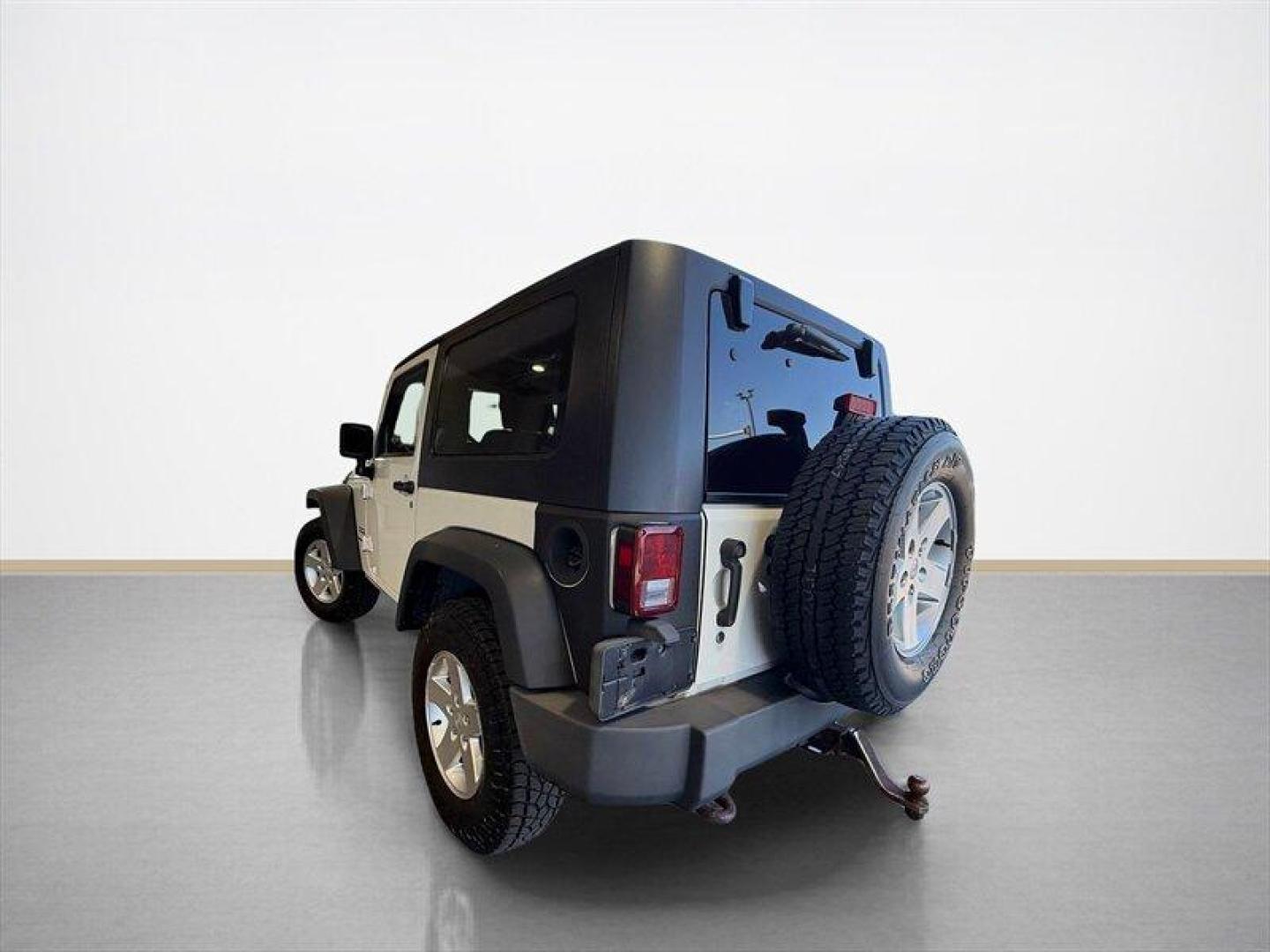 2010 Stone White Clear Coat Jeep Wrangler Sport (1J4AA2D11AL) with an 3.8L V6 202hp 237ft. lbs. engine, Automatic transmission, located at 25355 Eames Street, Channahon, IL, 60410, (815) 467-1807, 41.429108, -88.228432 - Some vehicles are transportation. Some are a lifestyle. This Wrangler is the real deallow miles, freshly serviced, and ready for whatever adventure comes next. 4x4 Low miles Hard top Cold A/C New tires New front brakes Freshly serviced No fancy gimmicks. No unnecessary extras. Just a classic Wran- Photo#5