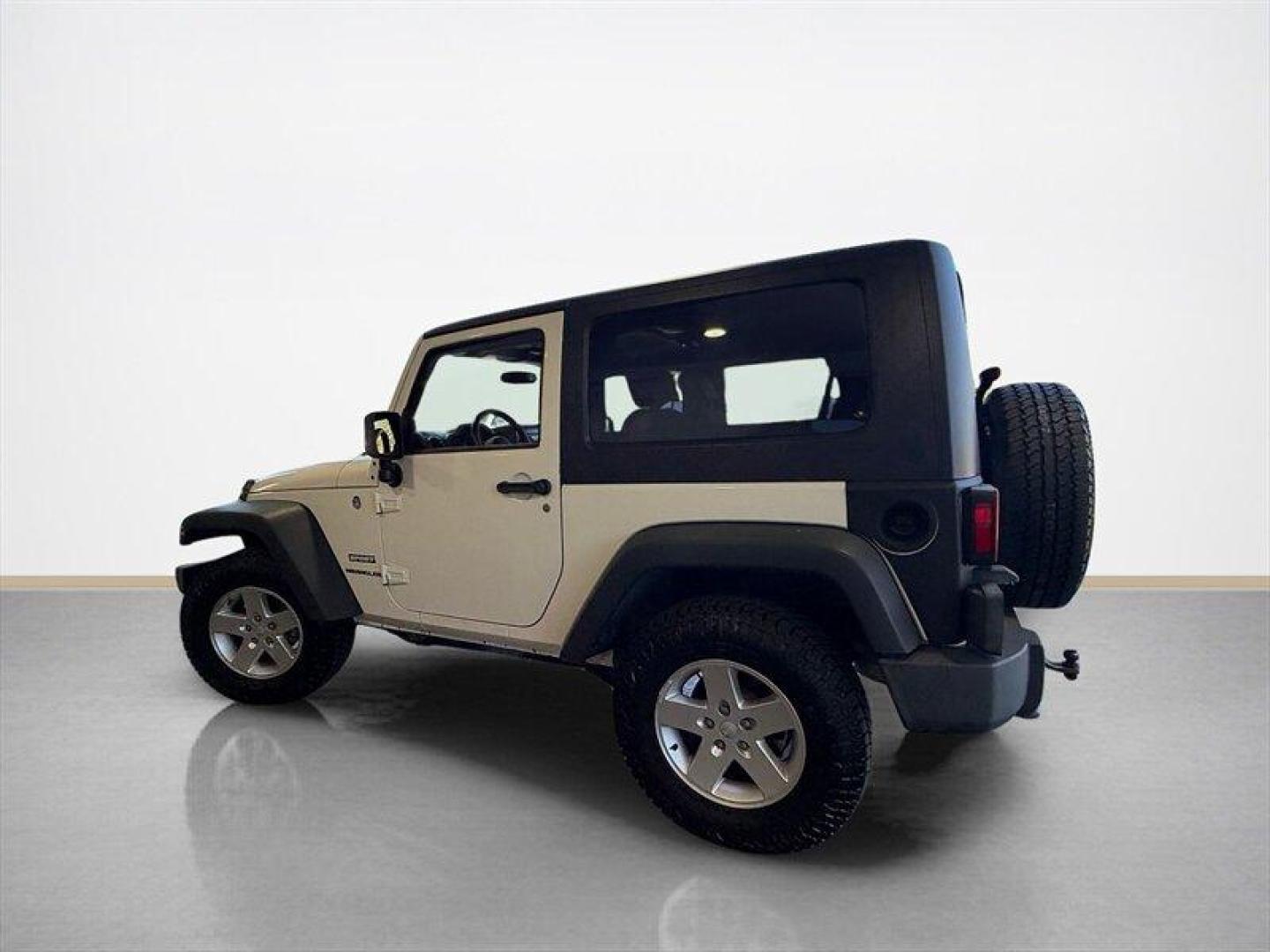 2010 Stone White Clear Coat Jeep Wrangler Sport (1J4AA2D11AL) with an 3.8L V6 202hp 237ft. lbs. engine, Automatic transmission, located at 25355 Eames Street, Channahon, IL, 60410, (815) 467-1807, 41.429108, -88.228432 - Some vehicles are transportation. Some are a lifestyle. This Wrangler is the real deallow miles, freshly serviced, and ready for whatever adventure comes next. 4x4 Low miles Hard top Cold A/C New tires New front brakes Freshly serviced No fancy gimmicks. No unnecessary extras. Just a classic Wran- Photo#6