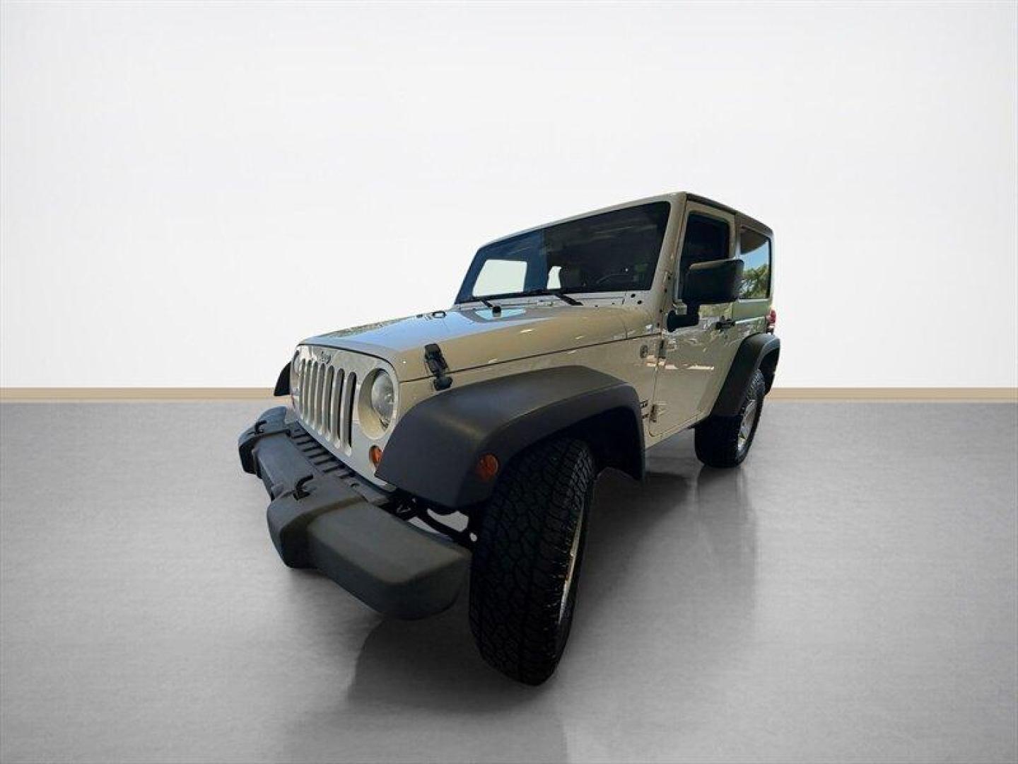 2010 Stone White Clear Coat Jeep Wrangler Sport (1J4AA2D11AL) with an 3.8L V6 202hp 237ft. lbs. engine, Automatic transmission, located at 25355 Eames Street, Channahon, IL, 60410, (815) 467-1807, 41.429108, -88.228432 - Some vehicles are transportation. Some are a lifestyle. This Wrangler is the real deallow miles, freshly serviced, and ready for whatever adventure comes next. 4x4 Low miles Hard top Cold A/C New tires New front brakes Freshly serviced No fancy gimmicks. No unnecessary extras. Just a classic Wran- Photo#7