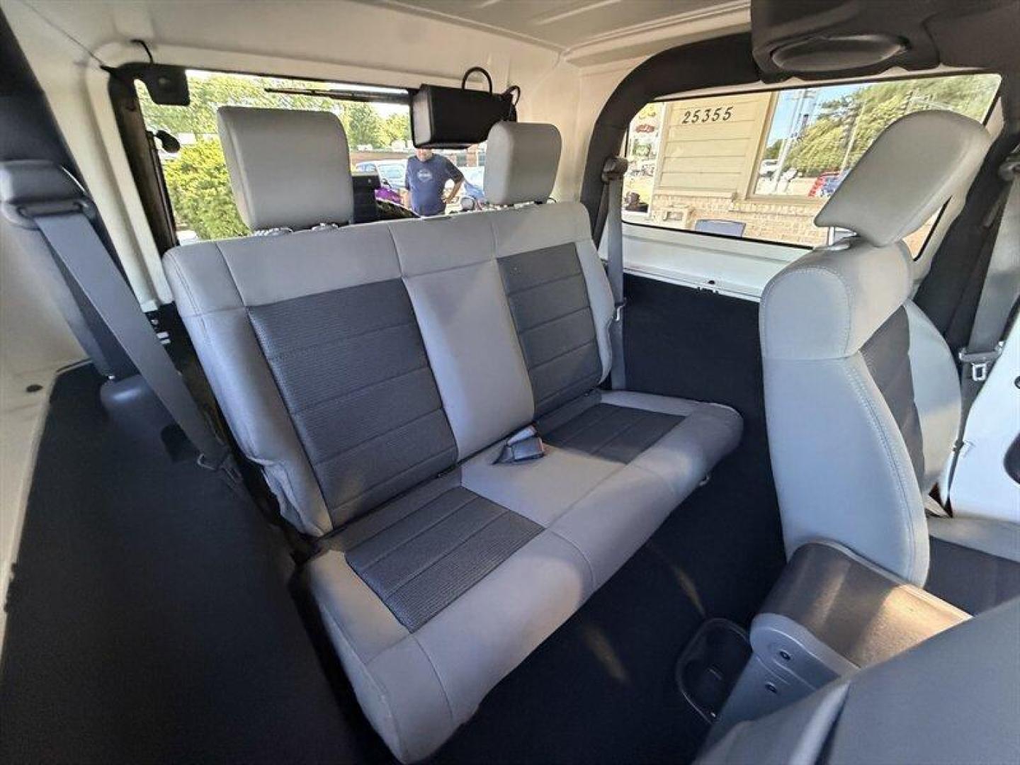 2010 Stone White Clear Coat Jeep Wrangler Sport (1J4AA2D11AL) with an 3.8L V6 202hp 237ft. lbs. engine, Automatic transmission, located at 25355 Eames Street, Channahon, IL, 60410, (815) 467-1807, 41.429108, -88.228432 - Some vehicles are transportation. Some are a lifestyle. This Wrangler is the real deallow miles, freshly serviced, and ready for whatever adventure comes next. 4x4 Low miles Hard top Cold A/C New tires New front brakes Freshly serviced No fancy gimmicks. No unnecessary extras. Just a classic Wran- Photo#12