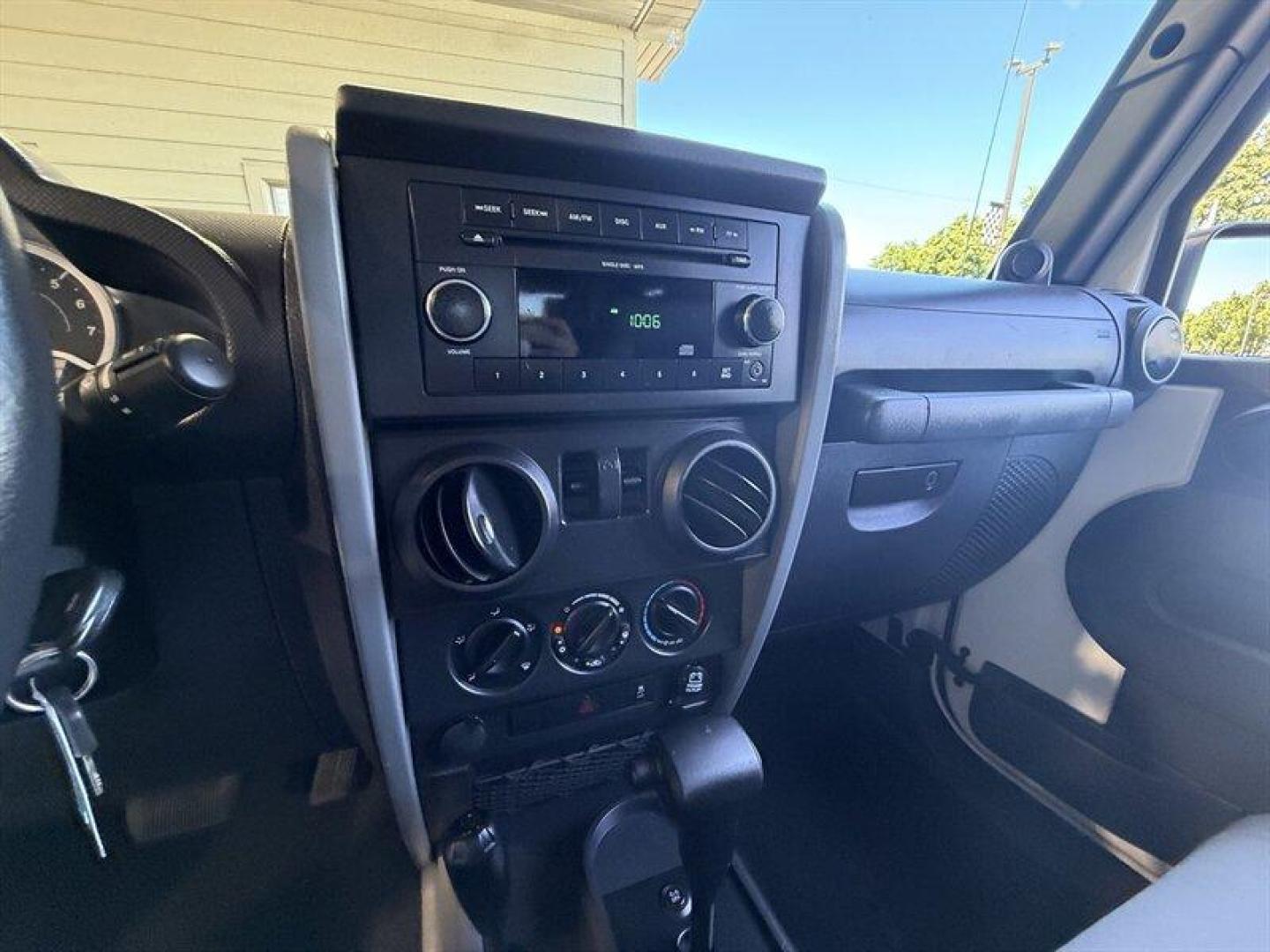 2010 Stone White Clear Coat Jeep Wrangler Sport (1J4AA2D11AL) with an 3.8L V6 202hp 237ft. lbs. engine, Automatic transmission, located at 25355 Eames Street, Channahon, IL, 60410, (815) 467-1807, 41.429108, -88.228432 - Some vehicles are transportation. Some are a lifestyle. This Wrangler is the real deallow miles, freshly serviced, and ready for whatever adventure comes next. 4x4 Low miles Hard top Cold A/C New tires New front brakes Freshly serviced No fancy gimmicks. No unnecessary extras. Just a classic Wran- Photo#15