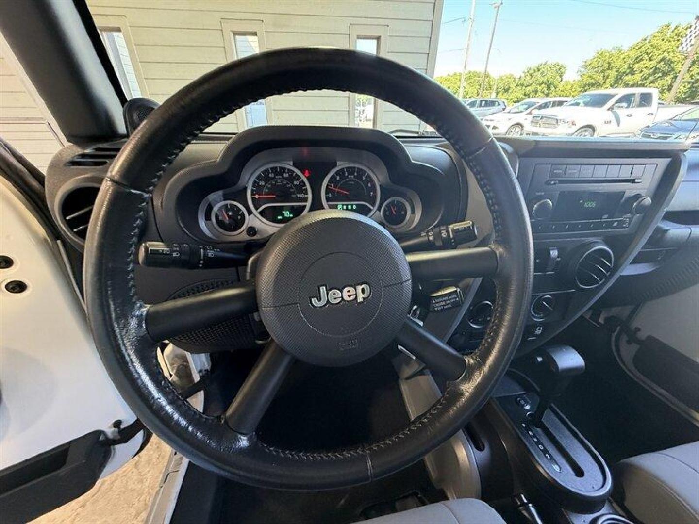 2010 Stone White Clear Coat Jeep Wrangler Sport (1J4AA2D11AL) with an 3.8L V6 202hp 237ft. lbs. engine, Automatic transmission, located at 25355 Eames Street, Channahon, IL, 60410, (815) 467-1807, 41.429108, -88.228432 - Some vehicles are transportation. Some are a lifestyle. This Wrangler is the real deallow miles, freshly serviced, and ready for whatever adventure comes next. 4x4 Low miles Hard top Cold A/C New tires New front brakes Freshly serviced No fancy gimmicks. No unnecessary extras. Just a classic Wran- Photo#16