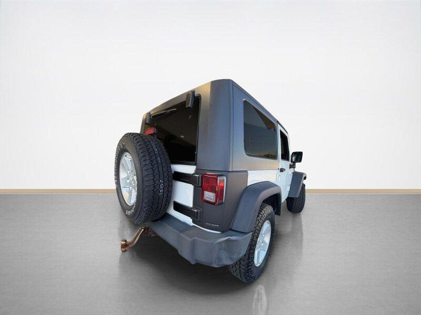 2010 Stone White Clear Coat Jeep Wrangler Sport (1J4AA2D11AL) with an 3.8L V6 202hp 237ft. lbs. engine, Automatic transmission, located at 25355 Eames Street, Channahon, IL, 60410, (815) 467-1807, 41.429108, -88.228432 - Some vehicles are transportation. Some are a lifestyle. This Wrangler is the real deallow miles, freshly serviced, and ready for whatever adventure comes next. 4x4 Low miles Hard top Cold A/C New tires New front brakes Freshly serviced No fancy gimmicks. No unnecessary extras. Just a classic Wran- Photo#3