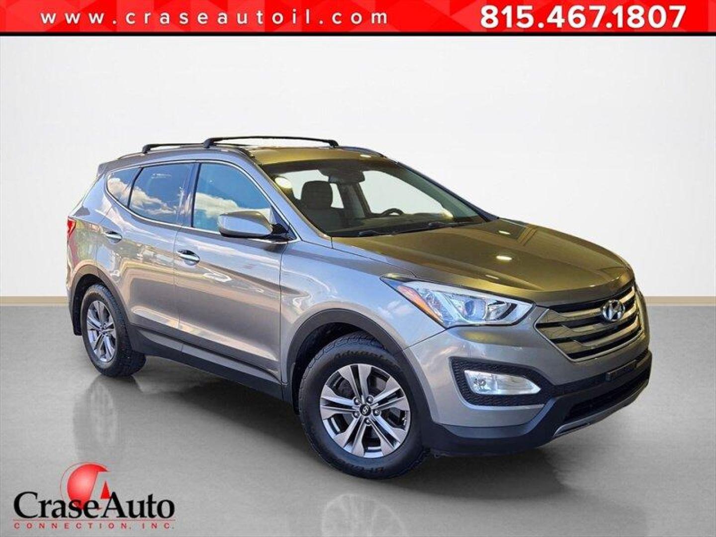 2015 Mineral Gray Hyundai Santa Fe (5XYZUDLBXFG) with an 2.4L I4 190hp 181ft. lbs. engine, Automatic transmission, located at 25355 Eames Street, Channahon, IL, 60410, (815) 467-1807, 41.429108, -88.228432 - Experience reliable performance and practical design with this 2015 Hyundai Santa Fe 2.4L. Powered by a 2.4L inline-4 engine delivering 190 horsepower and 181 lb-ft of torque, this SUV offers a balanced combination of power and efficiency. Finished in Mineral Gray on the exterior and complemented by - Photo#0
