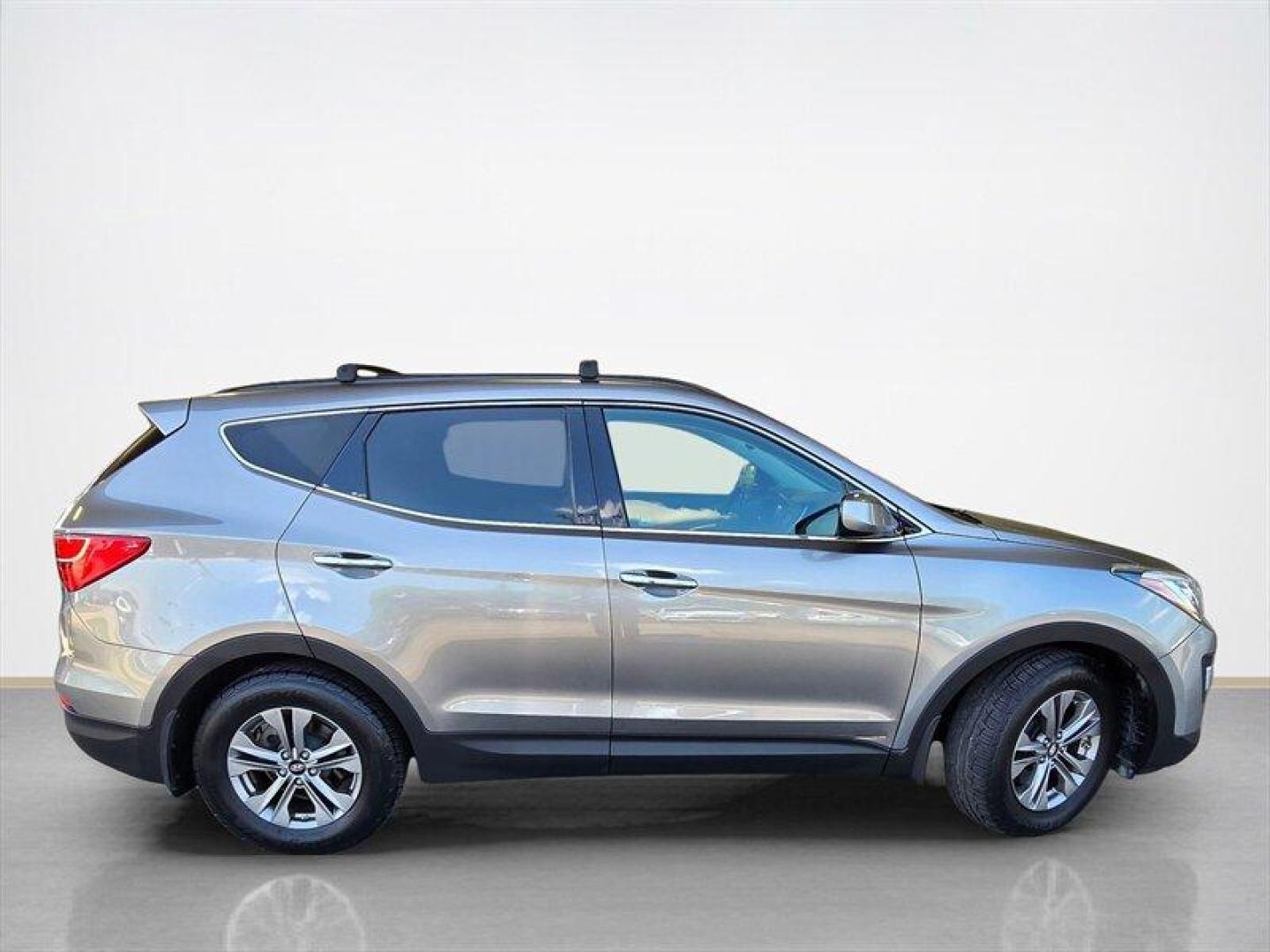 2015 Mineral Gray Hyundai Santa Fe (5XYZUDLBXFG) with an 2.4L I4 190hp 181ft. lbs. engine, Automatic transmission, located at 25355 Eames Street, Channahon, IL, 60410, (815) 467-1807, 41.429108, -88.228432 - Experience reliable performance and practical design with this 2015 Hyundai Santa Fe 2.4L. Powered by a 2.4L inline-4 engine delivering 190 horsepower and 181 lb-ft of torque, this SUV offers a balanced combination of power and efficiency. Finished in Mineral Gray on the exterior and complemented by - Photo#1