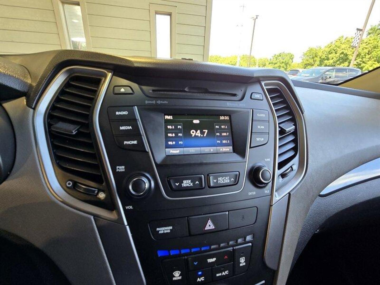 2015 Mineral Gray Hyundai Santa Fe (5XYZUDLBXFG) with an 2.4L I4 190hp 181ft. lbs. engine, Automatic transmission, located at 25355 Eames Street, Channahon, IL, 60410, (815) 467-1807, 41.429108, -88.228432 - Experience reliable performance and practical design with this 2015 Hyundai Santa Fe 2.4L. Powered by a 2.4L inline-4 engine delivering 190 horsepower and 181 lb-ft of torque, this SUV offers a balanced combination of power and efficiency. Finished in Mineral Gray on the exterior and complemented by - Photo#16
