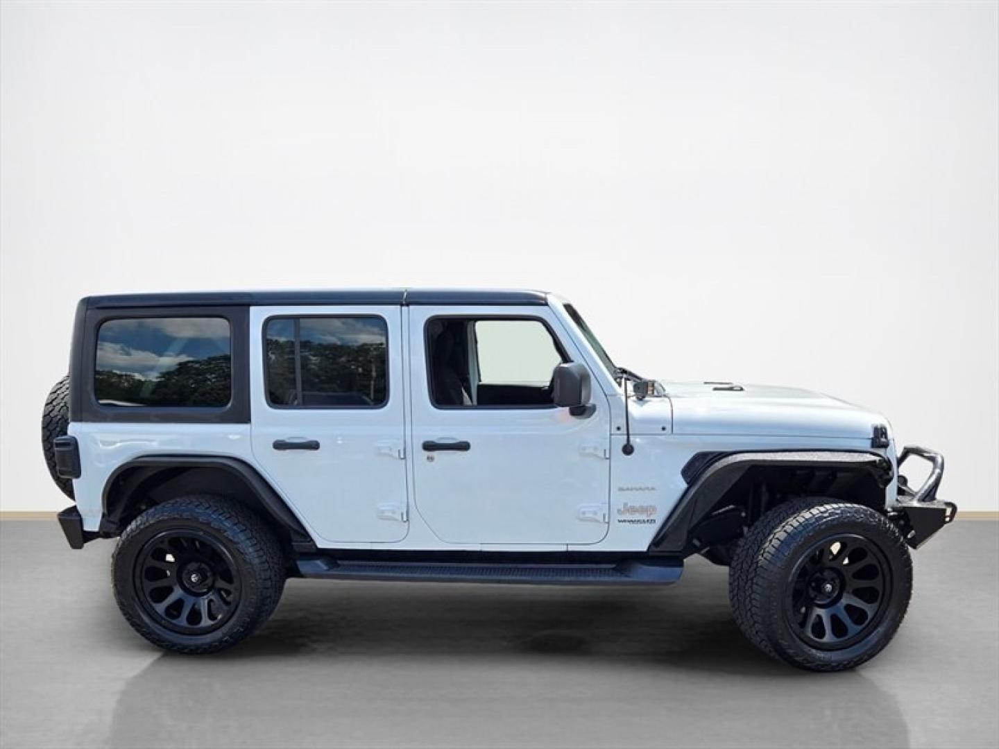 2020 Bright White Clear Coat Jeep Wrangler Unlimited Sahara (1C4HJXEG9LW) with an 3.6L V6 285hp 260ft. lbs. engine, 6 Speed Manual transmission, located at 25355 Eames Street, Channahon, IL, 60410, (815) 467-1807, 41.429108, -88.228432 - The 2020 Jeep Wrangler Unlimited Sahara is a versatile and capable SUV designed for both on-road comfort and off-road adventure. Powered by a 3.6L V6 engine delivering 285 horsepower and 260 lb-ft of torque, this model offers a balanced blend of performance and efficiency. Its fuel economy stands at- Photo#1