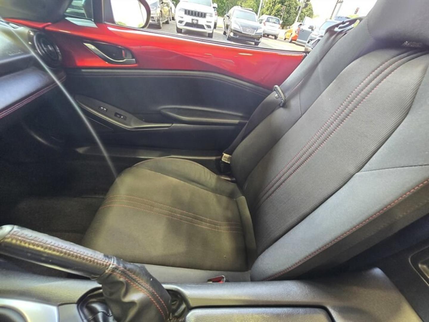 2016 Burgundy Mazda MX-5 Miata Club (JM1NDAC70G0) with an SKYACTIV-G 2.0L I4 155hp 148ft. lbs. engine, 5 Speed Manual transmission, located at 25355 Eames Street, Channahon, IL, 60410, (815) 467-1807, 41.429108, -88.228432 - The 2016 Mazda MX-5 Miata Club is a stylish and well-maintained sports car that offers an engaging driving experience. Powered by a SKYACTIV-G 2.0L inline-4 engine producing 155 horsepower and 148 lb-ft of torque, this model delivers a responsive ride with efficient fuel economy, achieving an estima- Photo#21