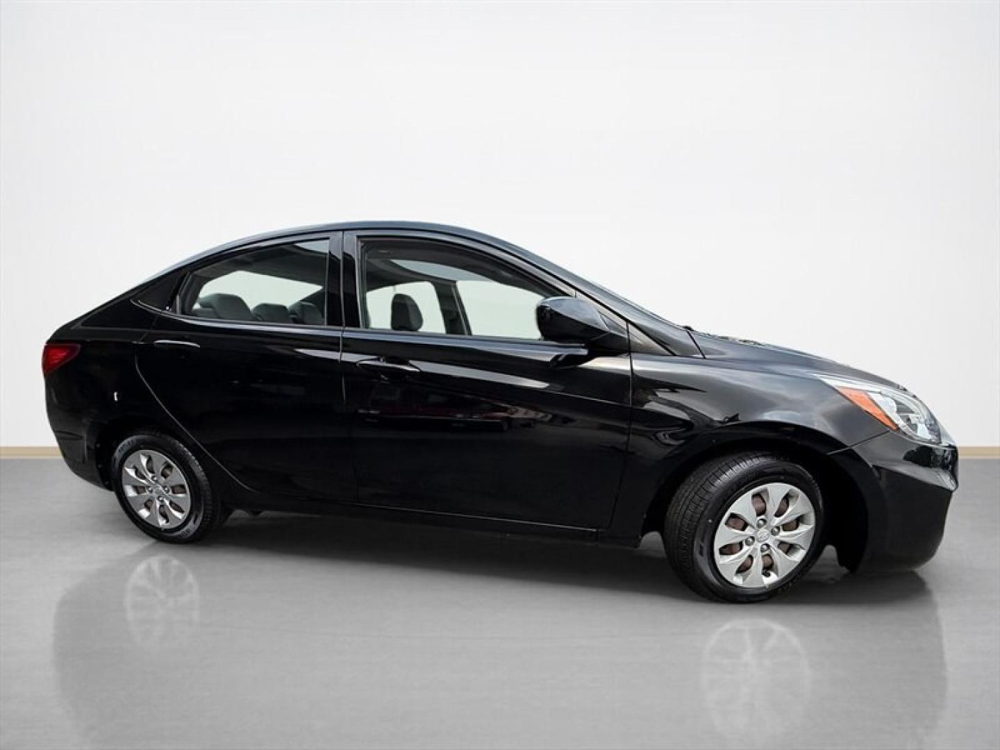 2015 Ultra Black Hyundai ACCENT GLS (KMHCT4AE3FU) with an 1.6L I4 137hp 123ft. lbs. engine, Automatic transmission, located at 25355 Eames Street, Channahon, IL, 60410, (815) 467-1807, 41.429108, -88.228432 - Experience reliable efficiency with this 2015 Hyundai ACCENT GLS, featuring a 1.6L I4 engine delivering 137 horsepower and 123 ft-lbs of torque. The Ultra Black exterior complements the clean Gray interior, creating a sleek and understated look. This ACCENT has been driven less than 63,000 miles, av- Photo#1