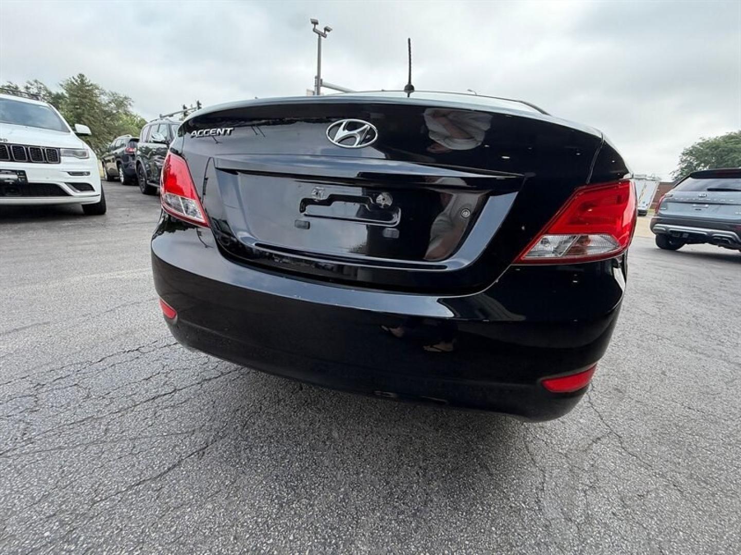 2015 Ultra Black Hyundai ACCENT GLS (KMHCT4AE3FU) with an 1.6L I4 137hp 123ft. lbs. engine, Automatic transmission, located at 25355 Eames Street, Channahon, IL, 60410, (815) 467-1807, 41.429108, -88.228432 - Experience reliable efficiency with this 2015 Hyundai ACCENT GLS, featuring a 1.6L I4 engine delivering 137 horsepower and 123 ft-lbs of torque. The Ultra Black exterior complements the clean Gray interior, creating a sleek and understated look. This ACCENT has been driven less than 63,000 miles, av- Photo#4
