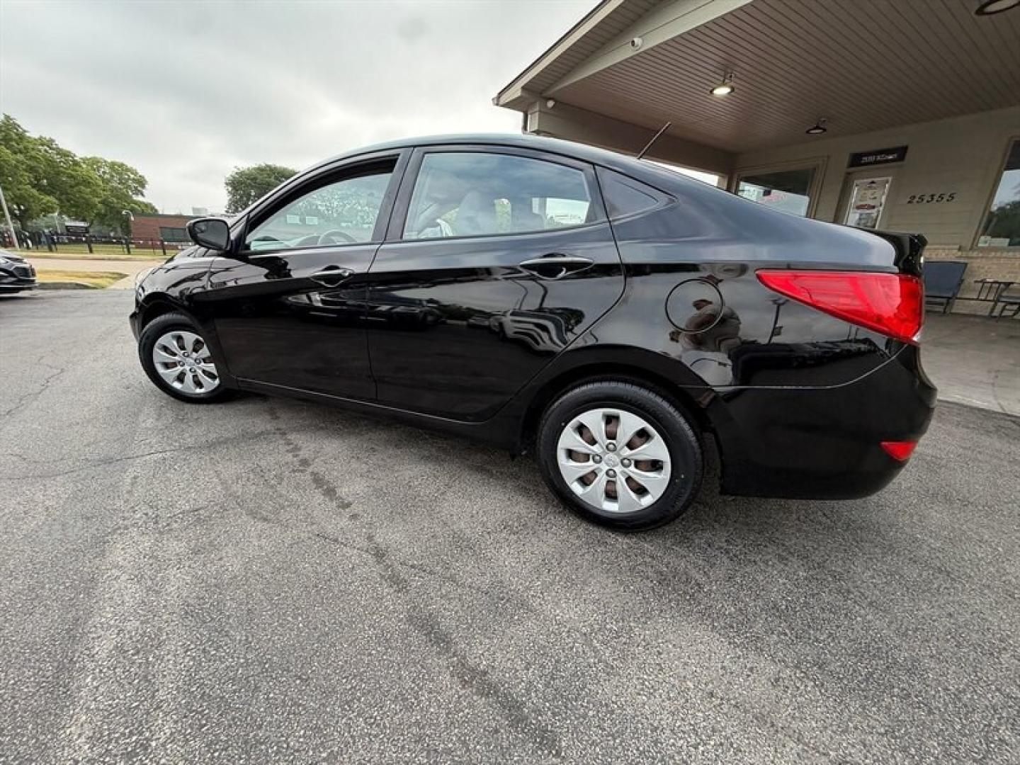 2015 Ultra Black Hyundai ACCENT GLS (KMHCT4AE3FU) with an 1.6L I4 137hp 123ft. lbs. engine, Automatic transmission, located at 25355 Eames Street, Channahon, IL, 60410, (815) 467-1807, 41.429108, -88.228432 - Experience reliable efficiency with this 2015 Hyundai ACCENT GLS, featuring a 1.6L I4 engine delivering 137 horsepower and 123 ft-lbs of torque. The Ultra Black exterior complements the clean Gray interior, creating a sleek and understated look. This ACCENT has been driven less than 63,000 miles, av- Photo#6
