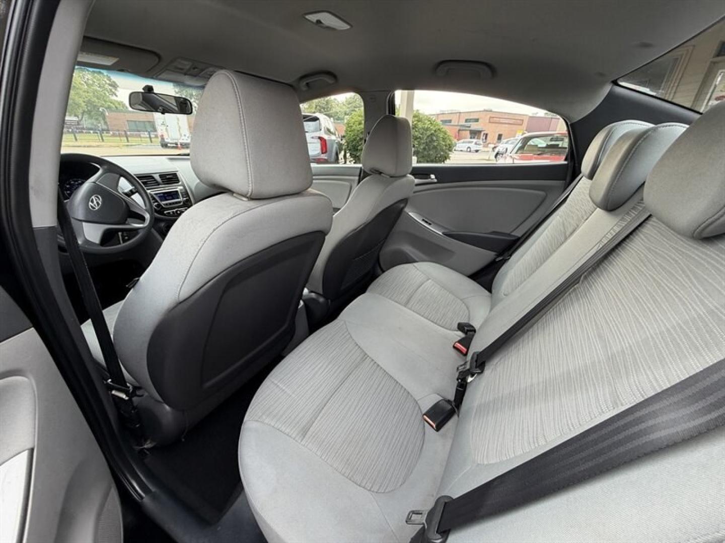 2015 Ultra Black Hyundai ACCENT GLS (KMHCT4AE3FU) with an 1.6L I4 137hp 123ft. lbs. engine, Automatic transmission, located at 25355 Eames Street, Channahon, IL, 60410, (815) 467-1807, 41.429108, -88.228432 - Experience reliable efficiency with this 2015 Hyundai ACCENT GLS, featuring a 1.6L I4 engine delivering 137 horsepower and 123 ft-lbs of torque. The Ultra Black exterior complements the clean Gray interior, creating a sleek and understated look. This ACCENT has been driven less than 63,000 miles, av- Photo#13