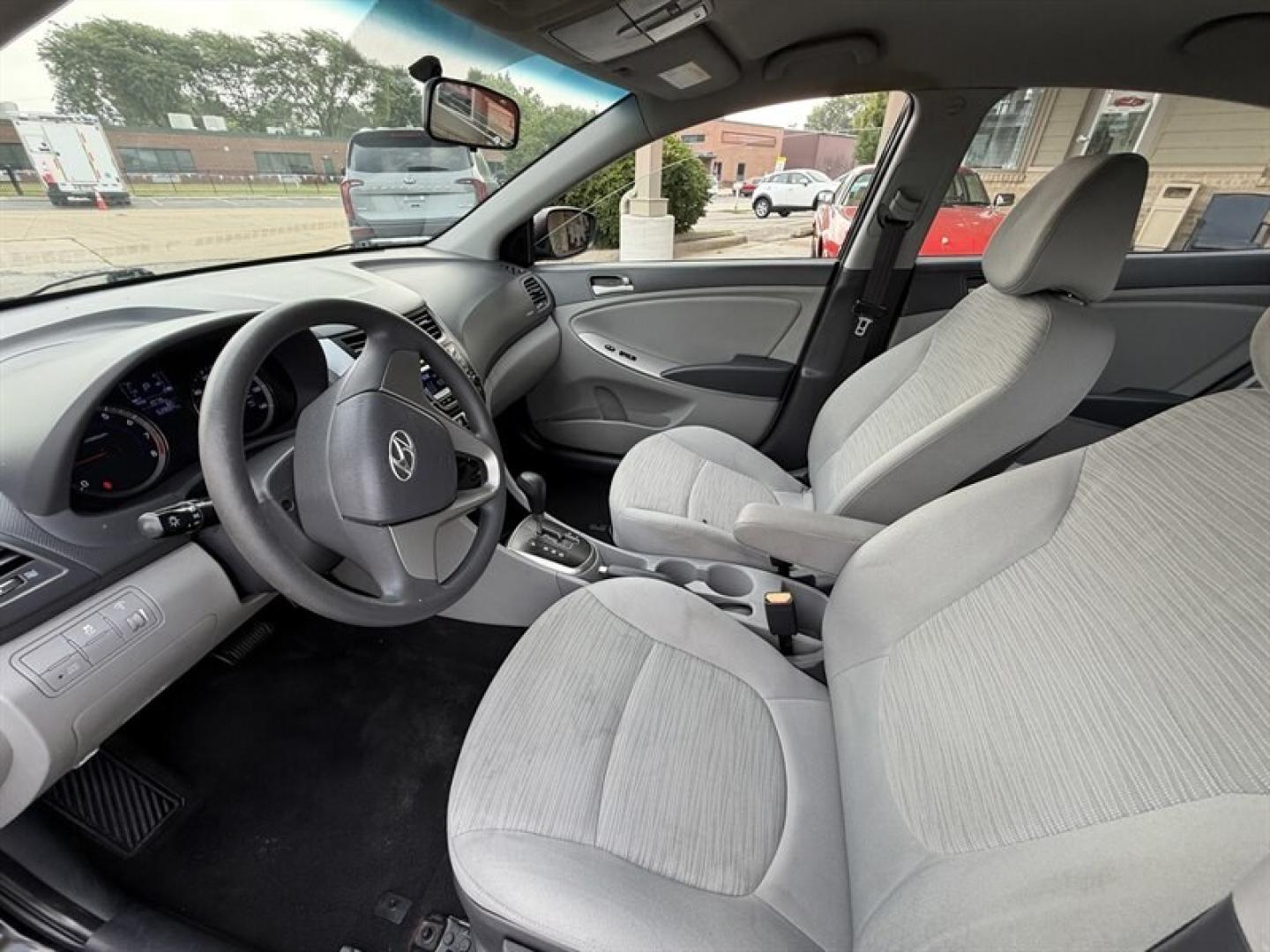 2015 Ultra Black Hyundai ACCENT GLS (KMHCT4AE3FU) with an 1.6L I4 137hp 123ft. lbs. engine, Automatic transmission, located at 25355 Eames Street, Channahon, IL, 60410, (815) 467-1807, 41.429108, -88.228432 - Experience reliable efficiency with this 2015 Hyundai ACCENT GLS, featuring a 1.6L I4 engine delivering 137 horsepower and 123 ft-lbs of torque. The Ultra Black exterior complements the clean Gray interior, creating a sleek and understated look. This ACCENT has been driven less than 63,000 miles, av- Photo#14