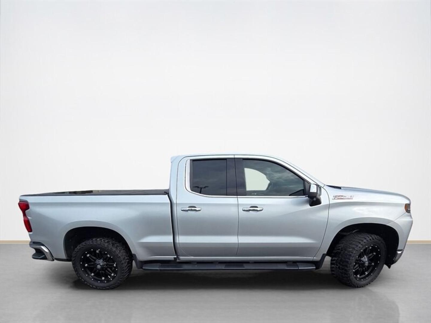 2019 Silver Ice Metallic Chevrolet Silverado 1500 LTZ (1GCRYGED0KZ) with an EcoTec3 5.3L V8 355hp 383ft. lbs. engine, Automatic transmission, located at 25355 Eames Street, Channahon, IL, 60410, (815) 467-1807, 41.429108, -88.228432 - The 2019 Chevrolet Silverado 1500 LTZ is equipped with a powerful EcoTec3 5.3L V8 engine delivering 355 horsepower and 383 lb-ft of torque. Finished in a sleek Silver exterior with a Black interior, this truck combines capability with a refined appearance. It has been driven below 70,000 miles, aver- Photo#1