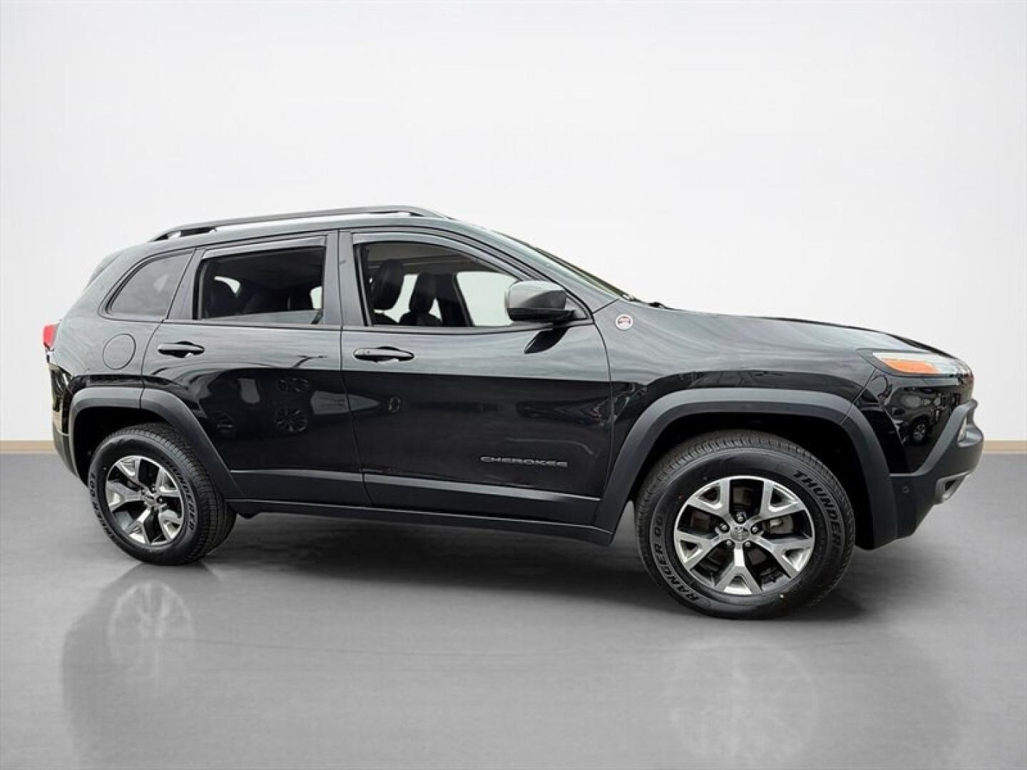 2015 Brilliant Black Crystal Pearl Coat Jeep Cherokee Trailhawk (1C4PJMBS3FW) with an 3.2L V6 271hp 239ft. lbs. engine, Automatic transmission, located at 25355 Eames Street, Channahon, IL, 60410, (815) 467-1807, 41.429108, -88.228432 - Ready to own the road and turn heads while youre at it? Meet this 2015 Jeep Cherokee Trailhawk, a total showstopper in sleek Granite Crystal Metallic Clear Coat. Under that tough hood, youll find a burly 3.2L V6 engine packing 271 horsepower and 239 ft-lbs of torquebecause sometimes, you gotta have- Photo#1