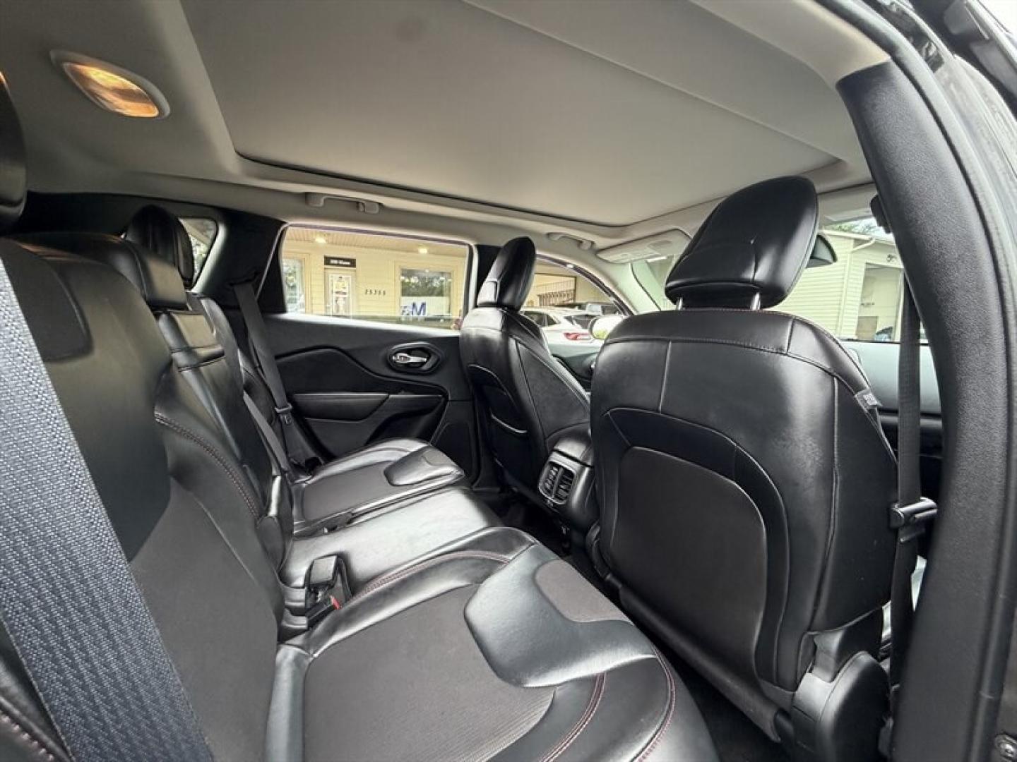 2015 Brilliant Black Crystal Pearl Coat Jeep Cherokee Trailhawk (1C4PJMBS3FW) with an 3.2L V6 271hp 239ft. lbs. engine, Automatic transmission, located at 25355 Eames Street, Channahon, IL, 60410, (815) 467-1807, 41.429108, -88.228432 - Ready to own the road and turn heads while youre at it? Meet this 2015 Jeep Cherokee Trailhawk, a total showstopper in sleek Granite Crystal Metallic Clear Coat. Under that tough hood, youll find a burly 3.2L V6 engine packing 271 horsepower and 239 ft-lbs of torquebecause sometimes, you gotta have- Photo#12