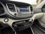 2017 Coliseum Gray Hyundai TUCSON AWD Value (KM8J3CA21HU) with an 1.6L Turbo I4 175hp 195ft. lbs. engine, Automatic transmission, located at 25355 Eames Street, Channahon, IL, 60410, (815) 467-1807, 41.429108, -88.228432 - Ready to roll in style and confidence? Check out this 2017 Hyundai Tucson Value, rocking that sleek Coliseum Gray exterior with a classy Gray interior that says, Ive arrived. Under the hood, you get a peppy 1.6L Turbo I4 engine pumping out 175 horsepower and 195 ft-lbs of torque enough zip to keep- Photo#17
