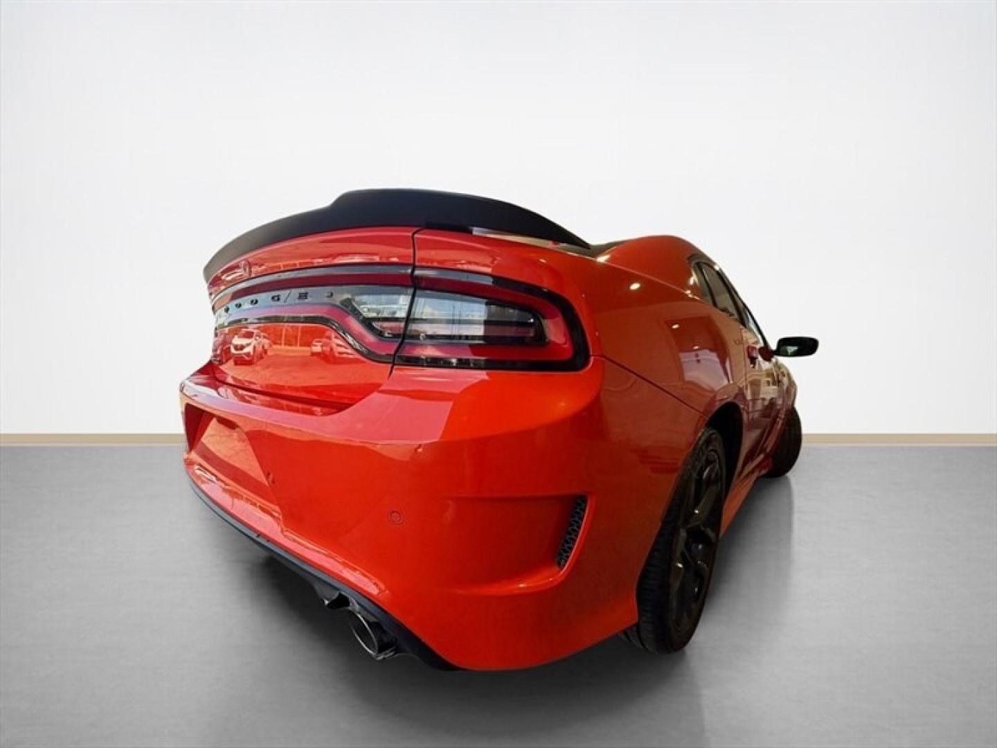 2021 Go Mango Dodge Charger R/T (2C3CDXCTXMH) with an HEMI 5.7L V8 370hp 395ft. lbs. engine, Automatic transmission, located at 25355 Eames Street, Channahon, IL, 60410, (815) 467-1807, 41.429108, -88.228432 - 2021 Dodge Charger R/T Plus HEMI Power in Go Mango! Turn every drive into an event with this head-turning Go Mango Charger R/T Plus, powered by the legendary 5.7L HEMI V8! It has the color, sound and muscle-car attitude you wantplus a loaded interior. 5.7L HEMI V8 engine Eight-speed automatic- Photo#3