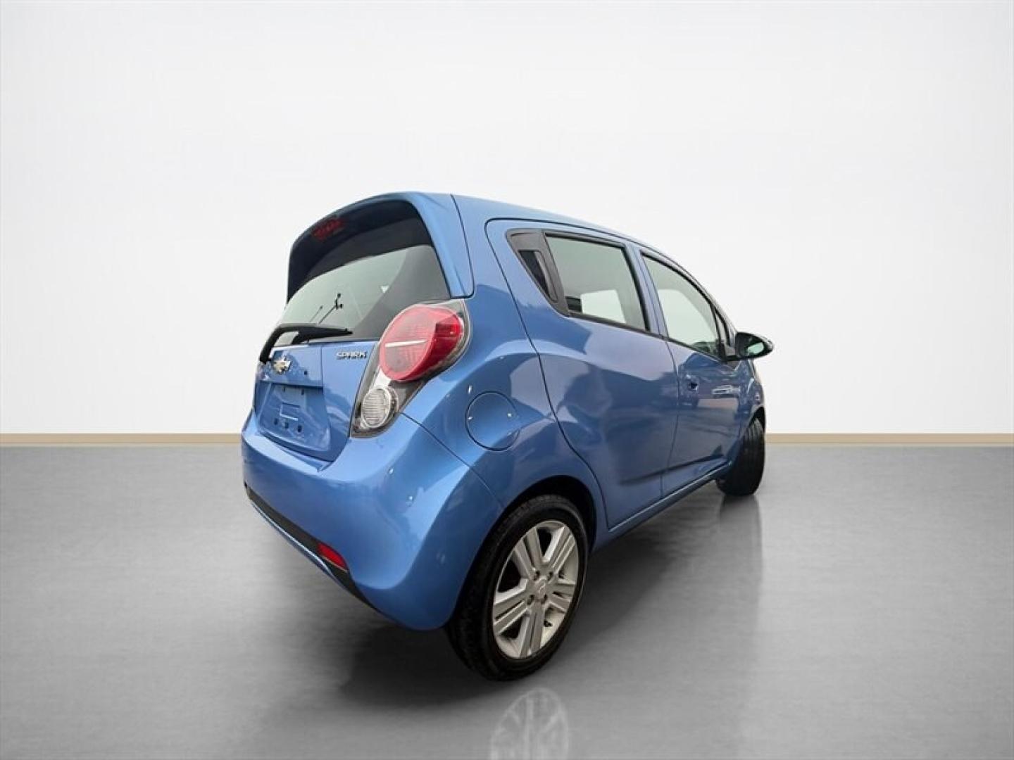 2014 Denim Metallic Chevrolet Spark LS (KL8CB6S9XEC) with an Ecotec 1.2L I4 84hp 83ft. lbs. engine, Automatic transmission, located at 25355 Eames Street, Channahon, IL, 60410, (815) 467-1807, 41.429108, -88.228432 - CHEVY SPARK LS GRAPE ICE! Looking for something affordable, dependable, and great on gas? This fun little hatchback is ready to go! ? Only 67,235 miles ? Automatic transmission ? Air conditioning ? Power windows and locks ? Convenient hatchback design ? Just serviced ? Excellent fuel economy Pe- Photo#3