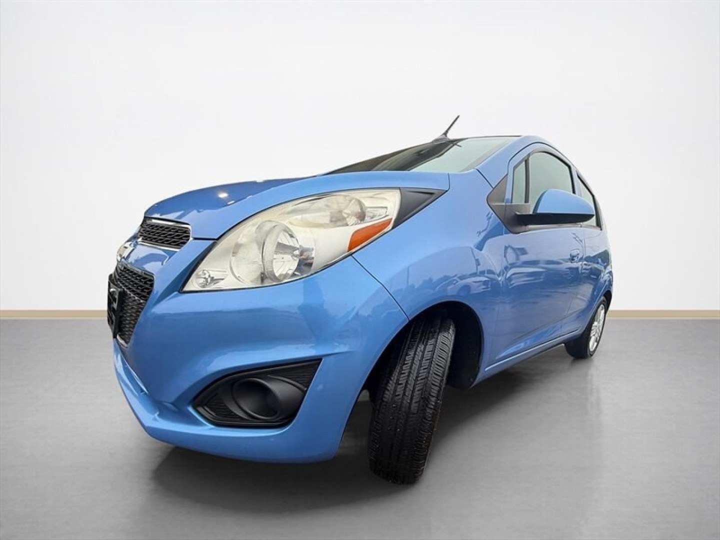 2014 Denim Metallic Chevrolet Spark LS (KL8CB6S9XEC) with an Ecotec 1.2L I4 84hp 83ft. lbs. engine, Automatic transmission, located at 25355 Eames Street, Channahon, IL, 60410, (815) 467-1807, 41.429108, -88.228432 - CHEVY SPARK LS GRAPE ICE! Looking for something affordable, dependable, and great on gas? This fun little hatchback is ready to go! ? Only 67,235 miles ? Automatic transmission ? Air conditioning ? Power windows and locks ? Convenient hatchback design ? Just serviced ? Excellent fuel economy Pe- Photo#7