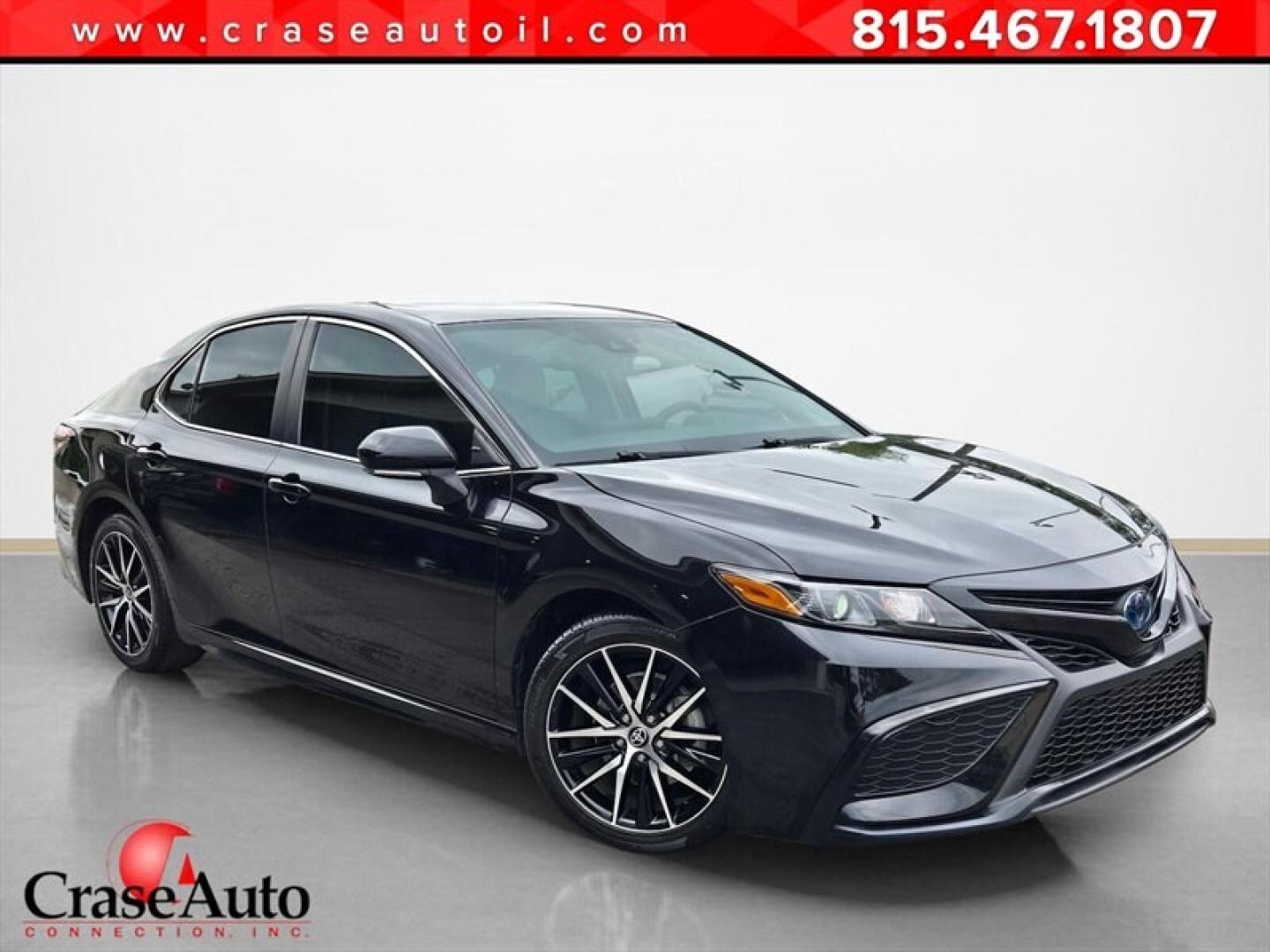 2023 Midnight Black Metallic Toyota Camry Hybrid SE (4T1S31AK5PU) with an 2.5L Hybrid I4 208hp engine, Automatic transmission, located at 25355 Eames Street, Channahon, IL, 60410, (815) 467-1807, 41.429108, -88.228432 - The 2023 Toyota Camry Hybrid SE combines efficiency, performance, and modern design in a sleek Black exterior with a matching Black interior. Powered by a 2.5L Hybrid I4 engine delivering 208 horsepower, this sedan offers an impressive fuel economy of 44 MPG in the city and 47 MPG on the highway, ma- Photo#0